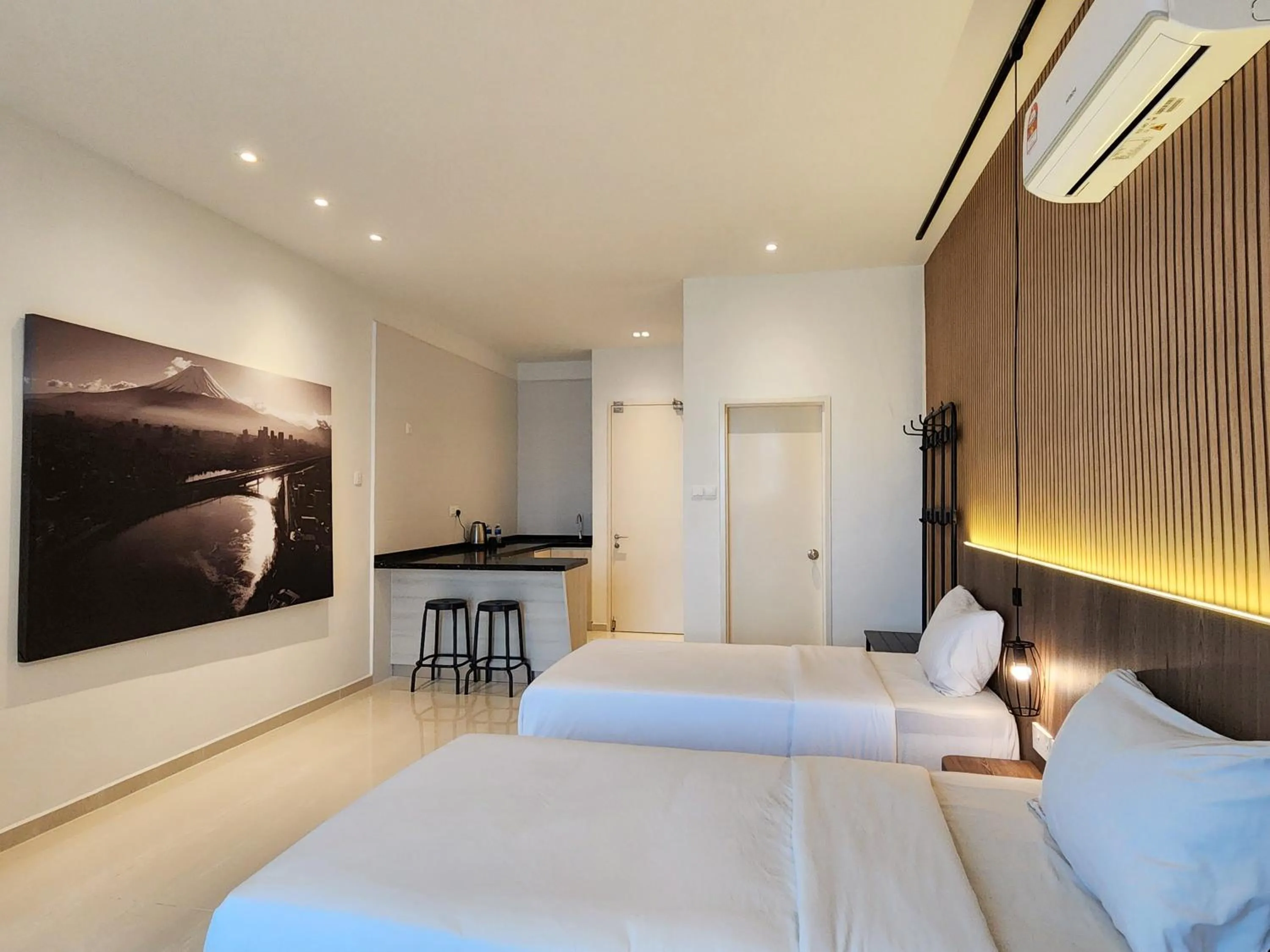 Bed in SKS Pavillion Suites