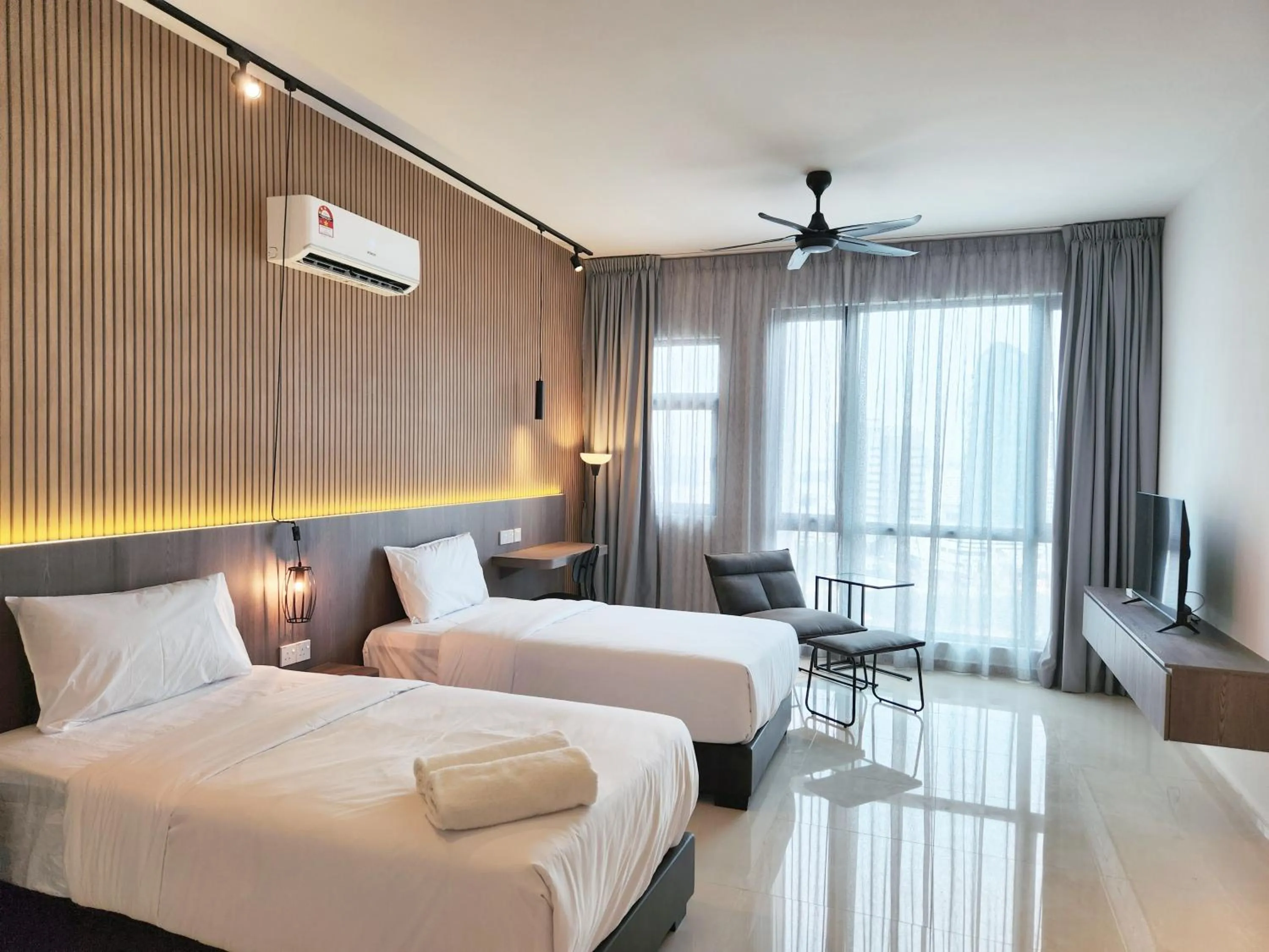 Bed in SKS Pavillion Suites