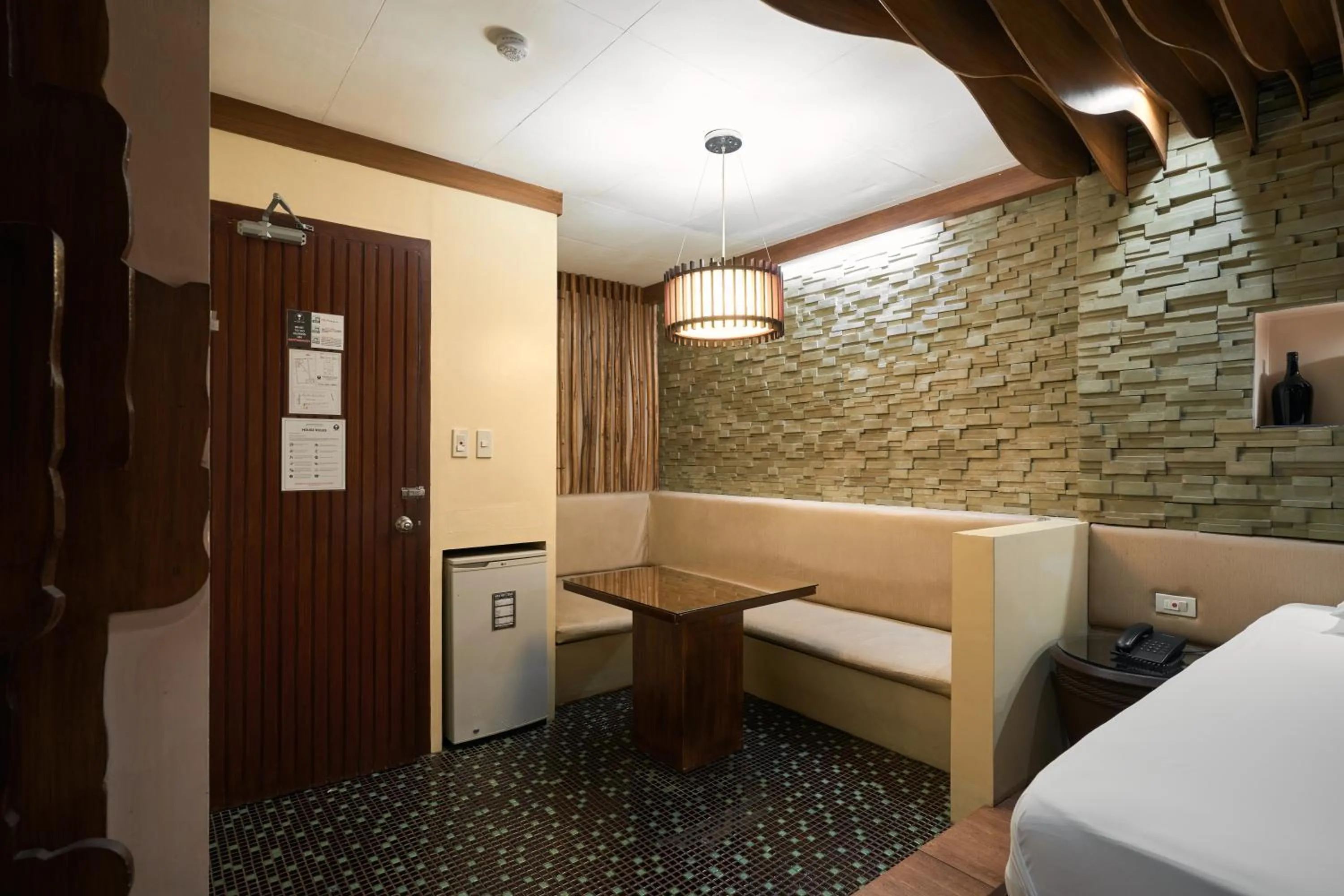 Bed in Victoria Court Suites - Pasig