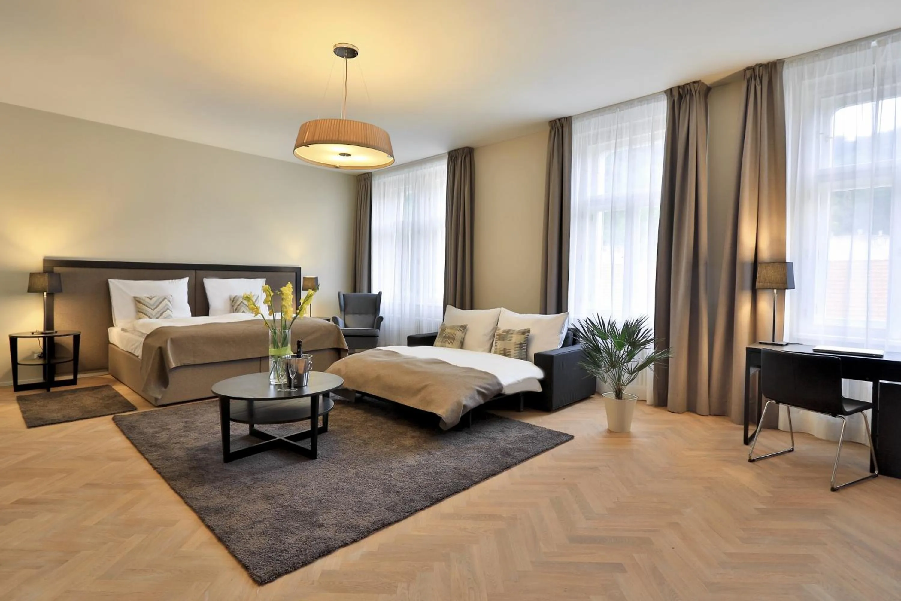 Living room, Bed in James Hotel & Apartments