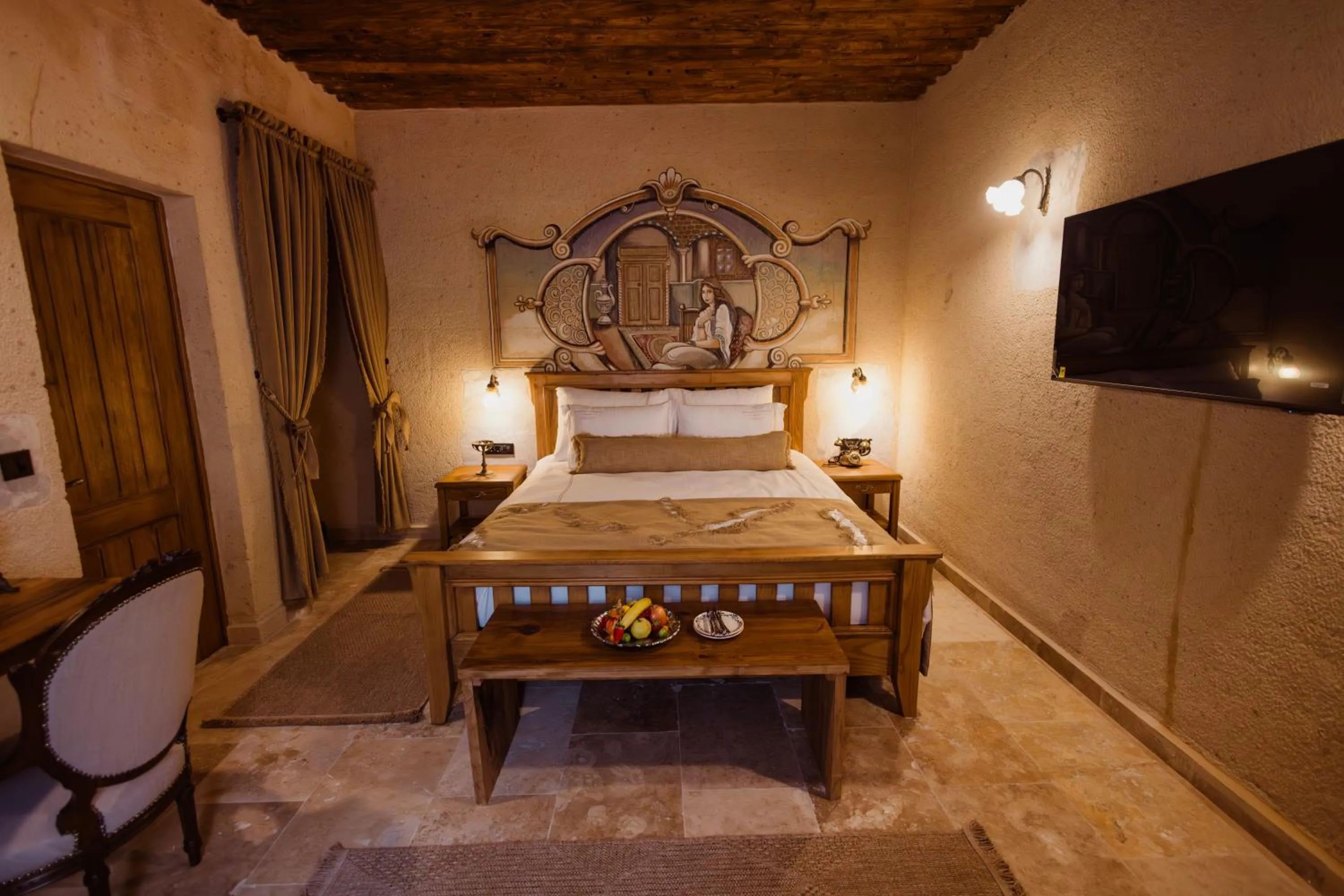 Bed in The Kingdom Of Cappadocia Luxury Cave Hotel