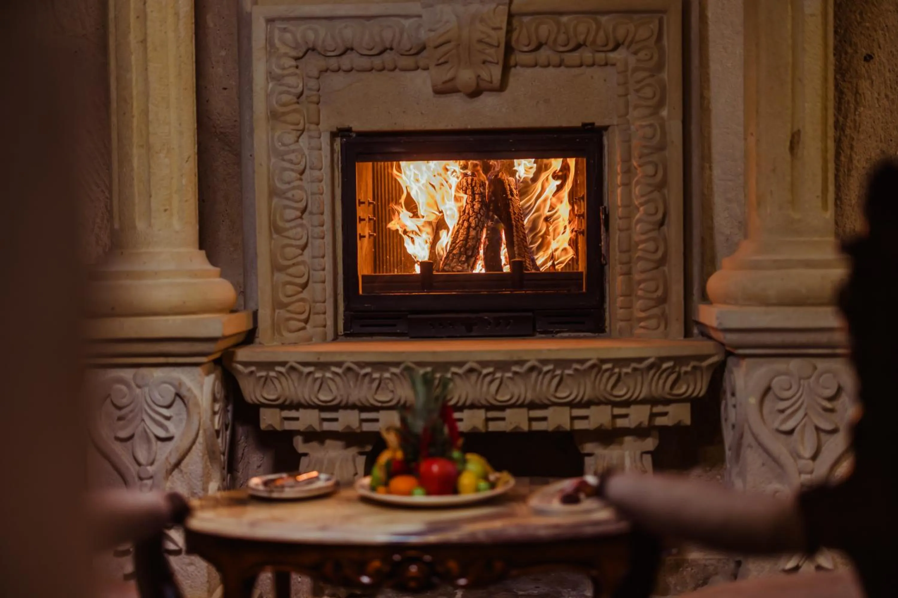fireplace in The Kingdom Of Cappadocia Luxury Cave Hotel