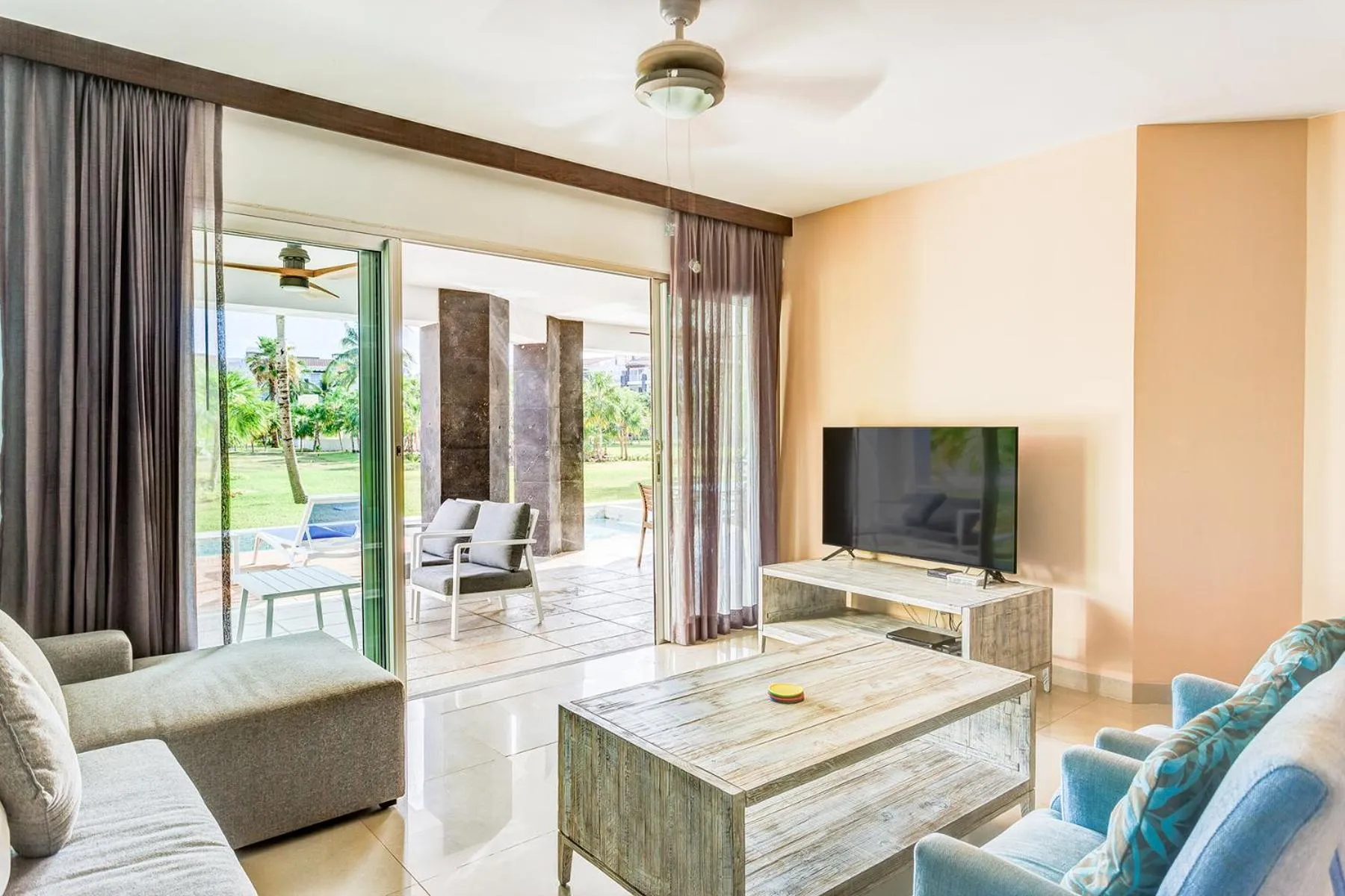 Communal lounge/ TV room in Luxury Condos at Mareazul Beachfront Complex with Resort-Style Amenities