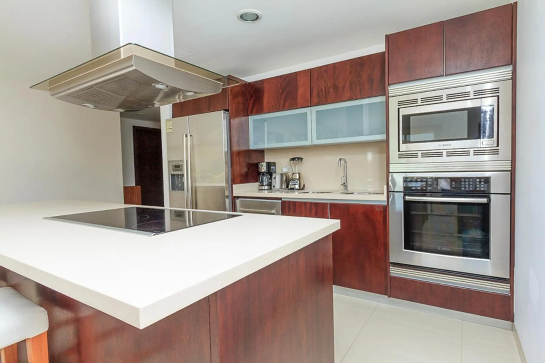 kitchen in Luxury Condos at Mareazul Beachfront Complex with Resort-Style Amenities