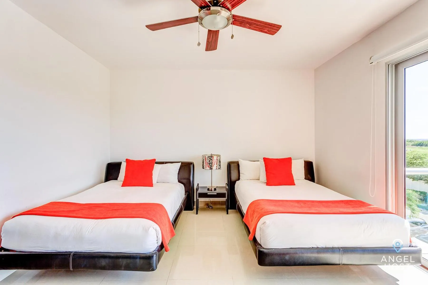 Bed in Luxury Condos at Mareazul Beachfront Complex with Resort-Style Amenities