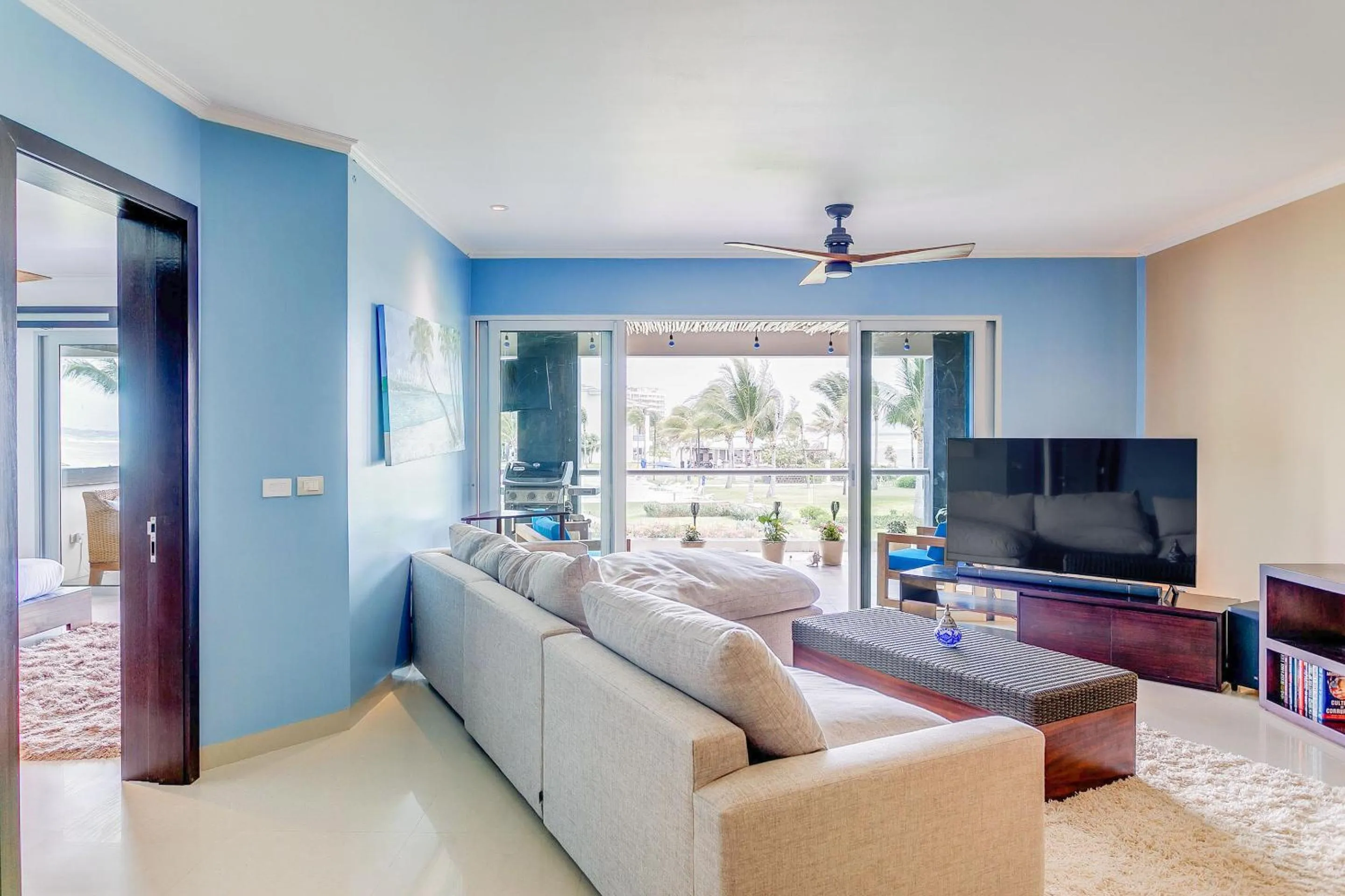 Living room in Luxury Condos at Mareazul Beachfront Complex with Resort-Style Amenities