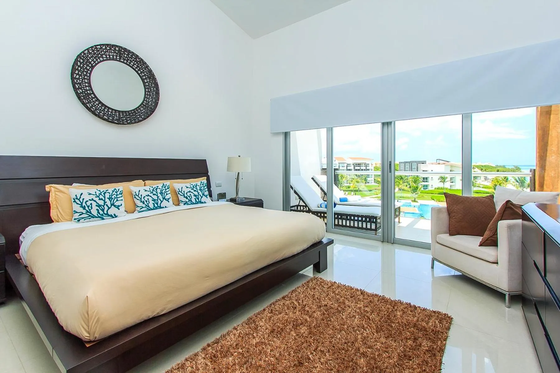 Bed in Luxury Condos at Mareazul Beachfront Complex with Resort-Style Amenities
