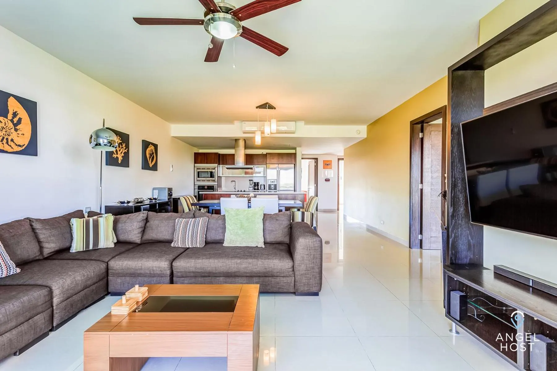 Communal lounge/ TV room in Luxury Condos at Mareazul Beachfront Complex with Resort-Style Amenities