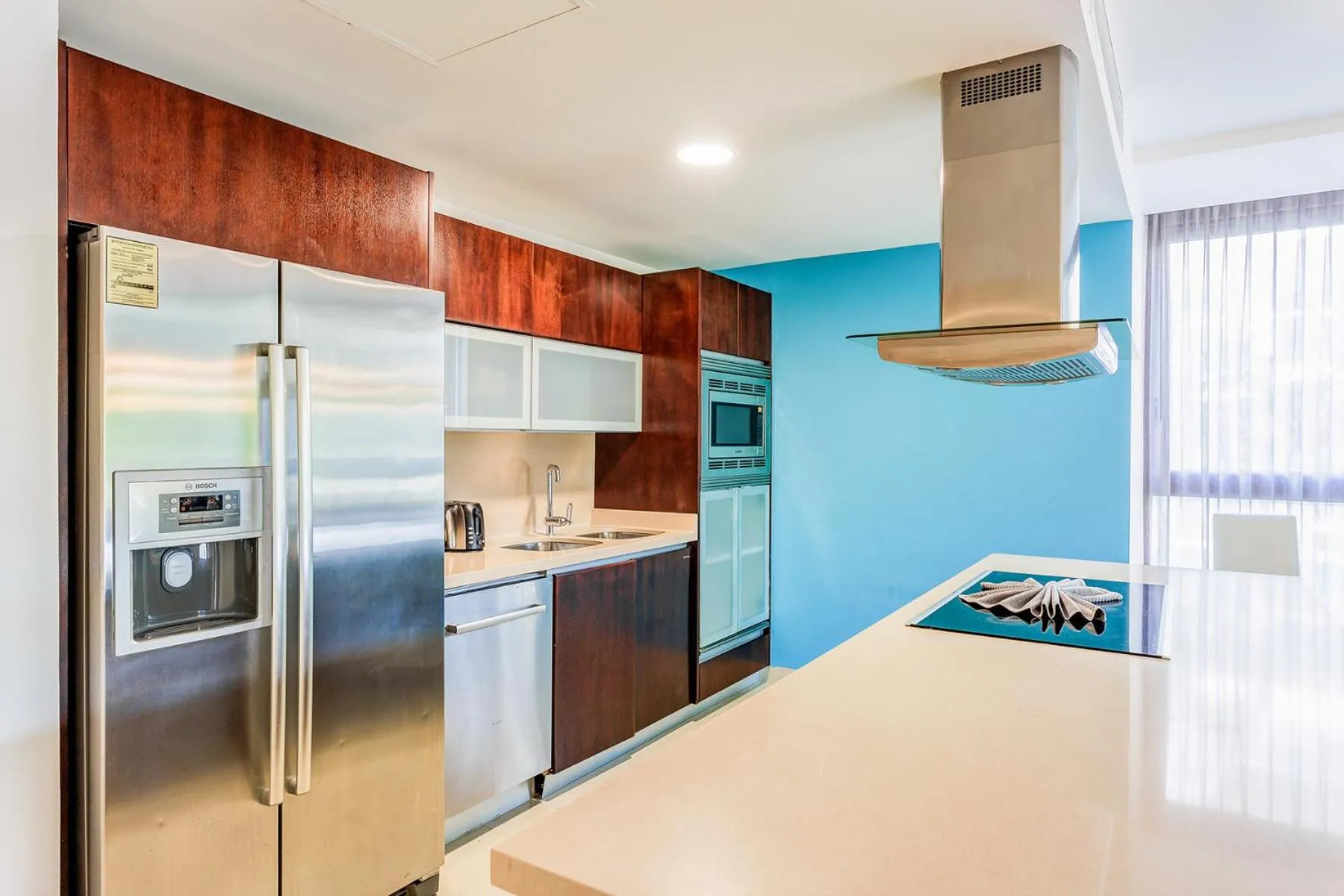 Kitchen or kitchenette in Luxury Condos at Mareazul Beachfront Complex with Resort-Style Amenities
