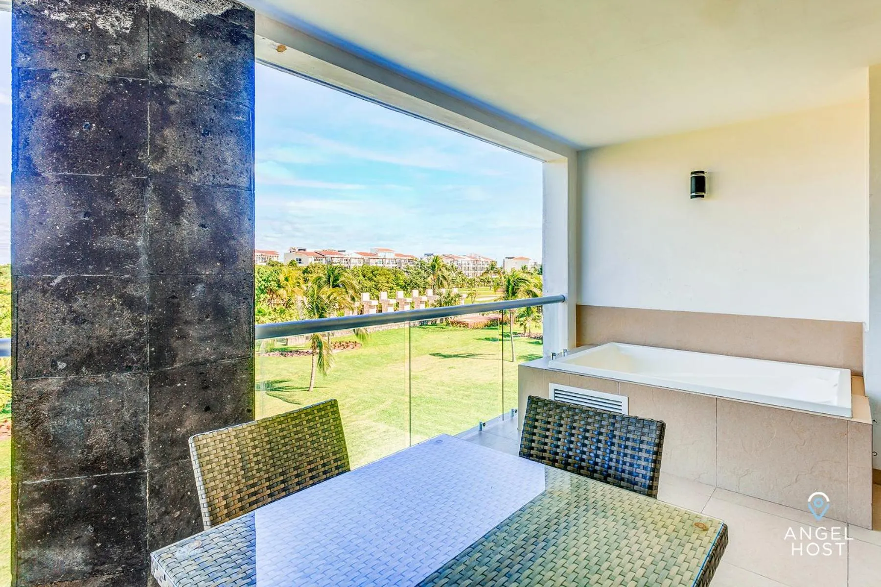Patio in Luxury Condos at Mareazul Beachfront Complex with Resort-Style Amenities