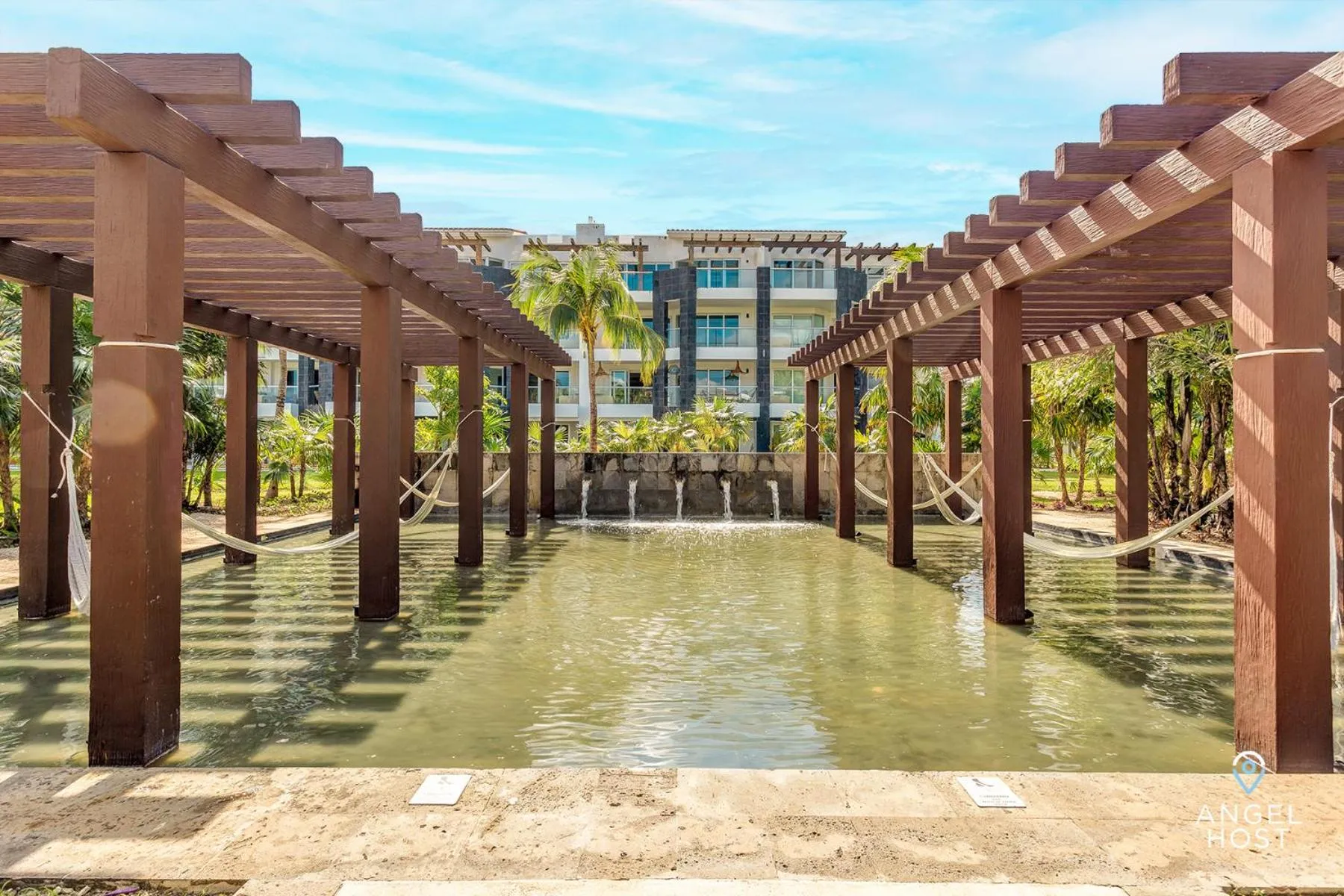 Property building in Luxury Condos at Mareazul Beachfront Complex with Resort-Style Amenities