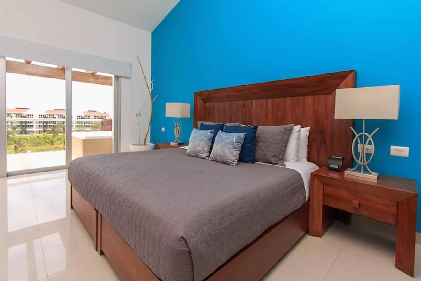 Bed in Luxury Condos at Mareazul Beachfront Complex with Resort-Style Amenities