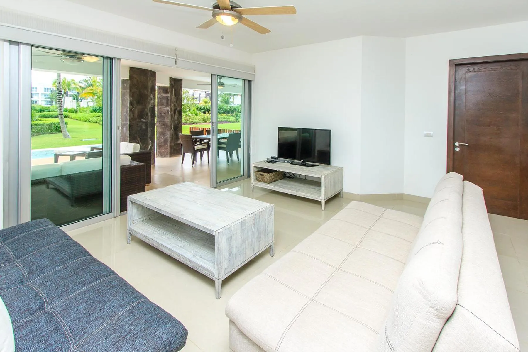 Communal lounge/ TV room in Luxury Condos at Mareazul Beachfront Complex with Resort-Style Amenities