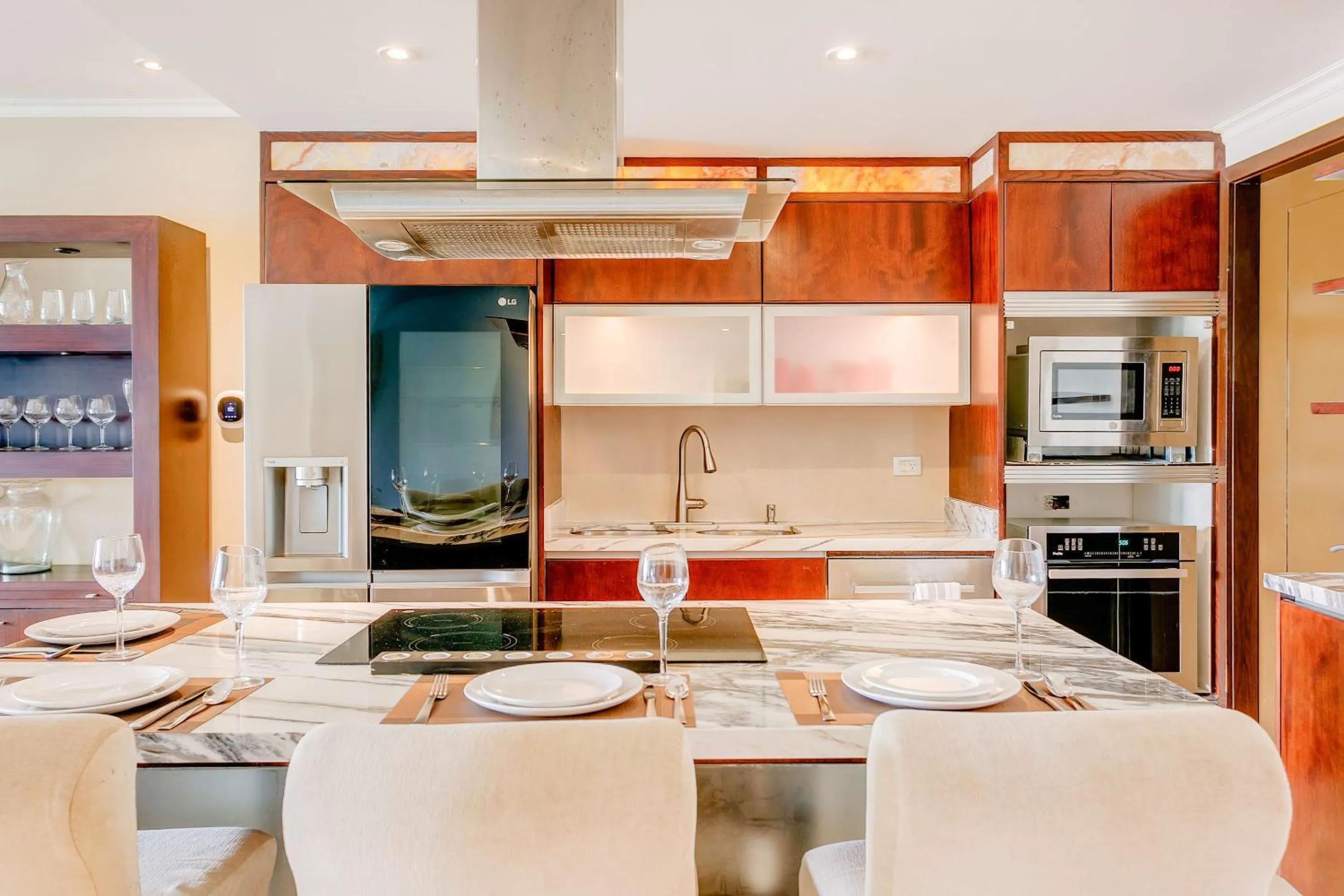 Kitchen or kitchenette in Luxury Condos at Mareazul Beachfront Complex with Resort-Style Amenities