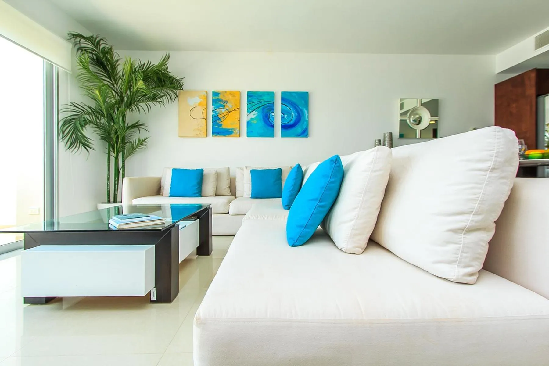 Living room in Luxury Condos at Mareazul Beachfront Complex with Resort-Style Amenities