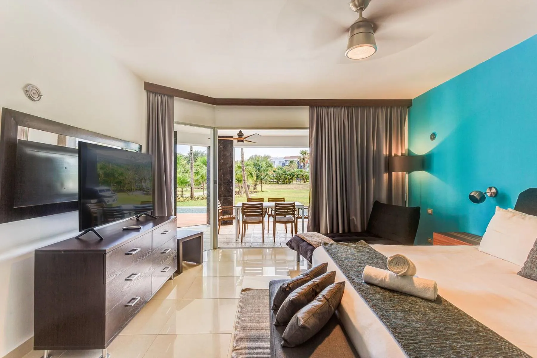 Communal lounge/ TV room in Luxury Condos at Mareazul Beachfront Complex with Resort-Style Amenities
