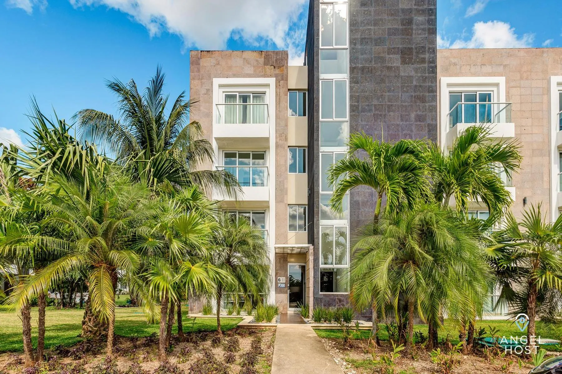 Property building in Luxury Condos at Mareazul Beachfront Complex with Resort-Style Amenities
