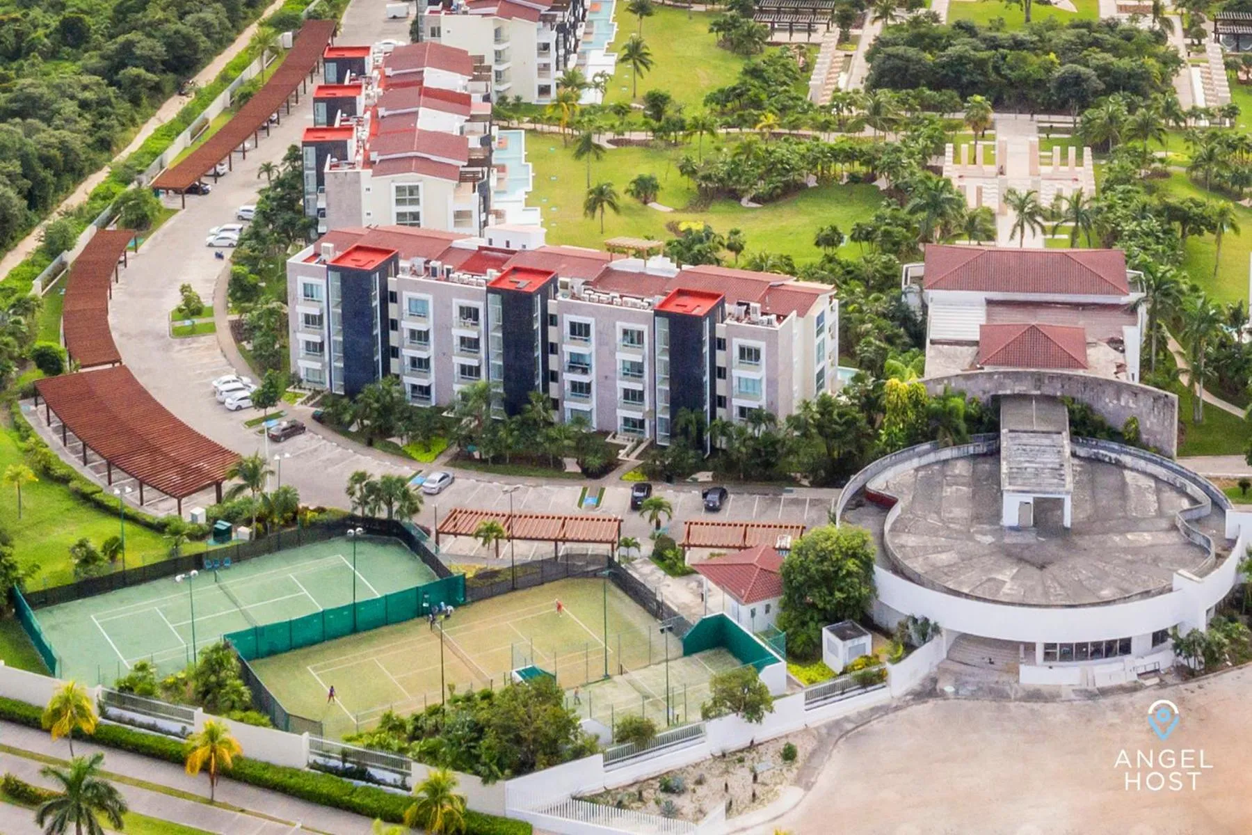 Property building in Luxury Condos at Mareazul Beachfront Complex with Resort-Style Amenities