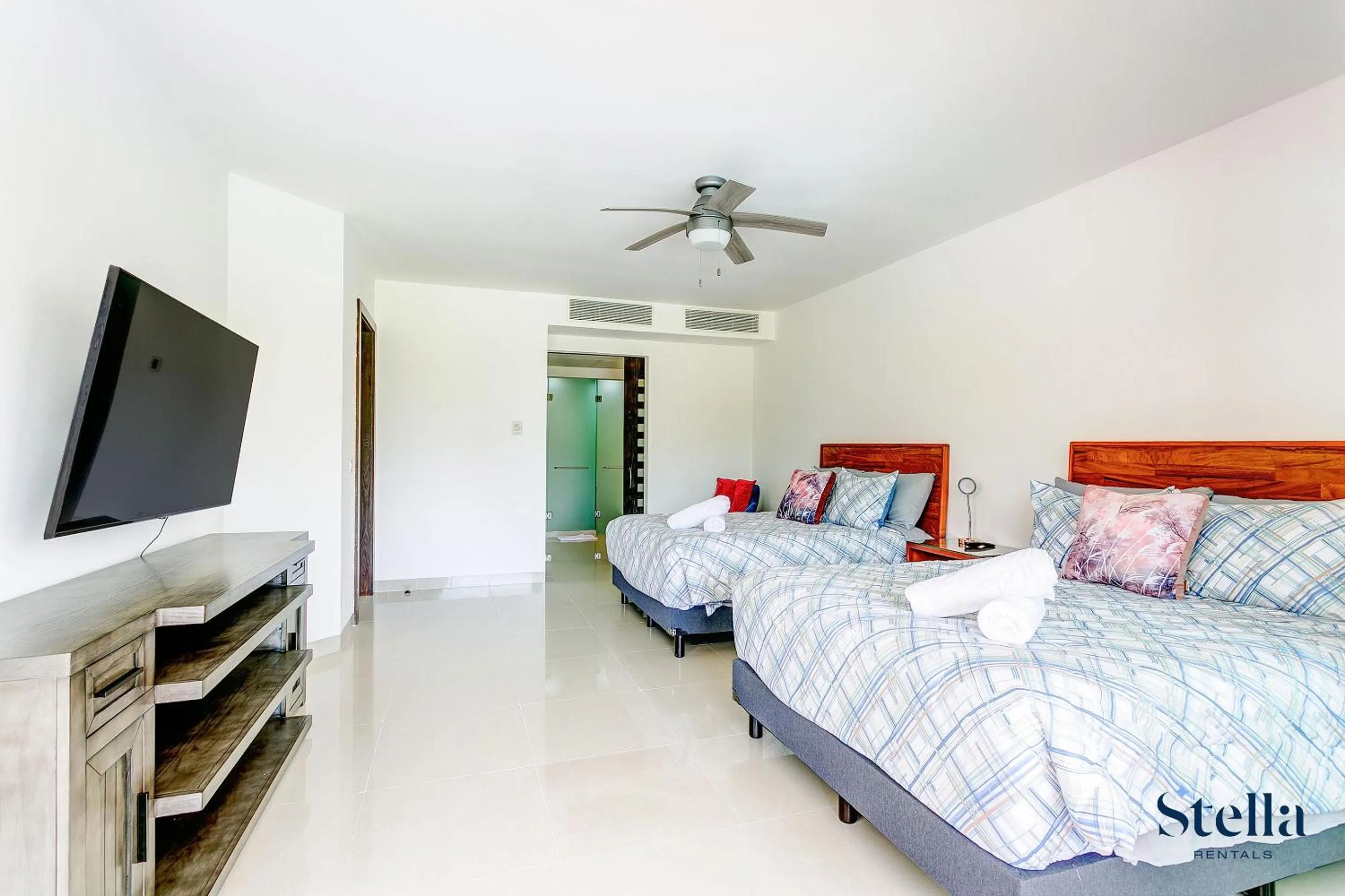 Bed in Luxury Condos at Mareazul Beachfront Complex with Resort-Style Amenities