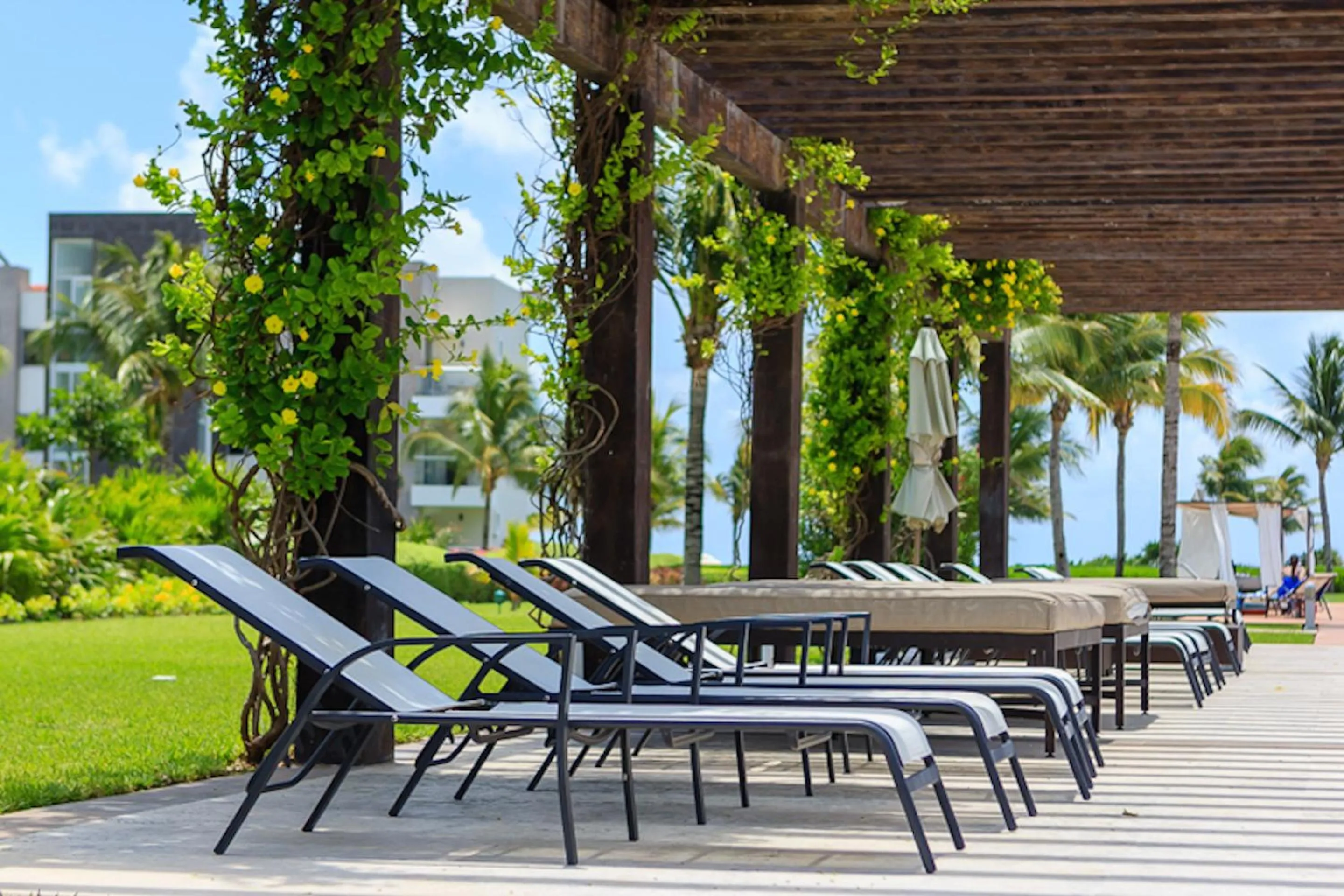 Garden in Luxury Condos at Mareazul Beachfront Complex with Resort-Style Amenities