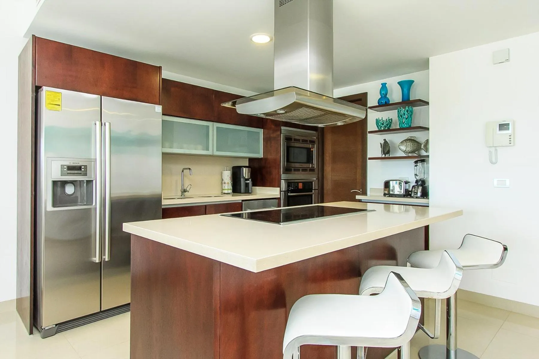 Kitchen or kitchenette in Luxury Condos at Mareazul Beachfront Complex with Resort-Style Amenities