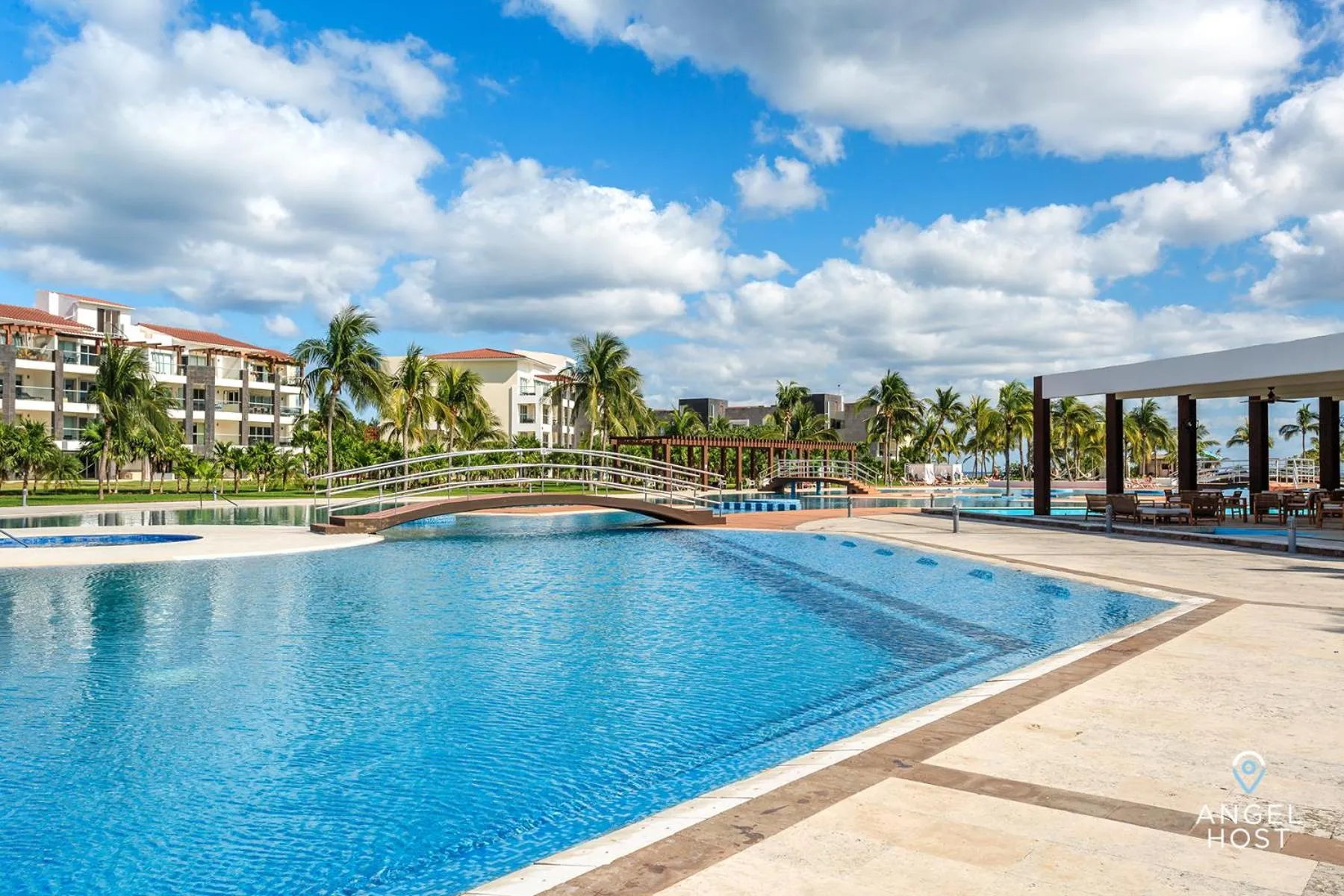 Property building in Luxury Condos at Mareazul Beachfront Complex with Resort-Style Amenities