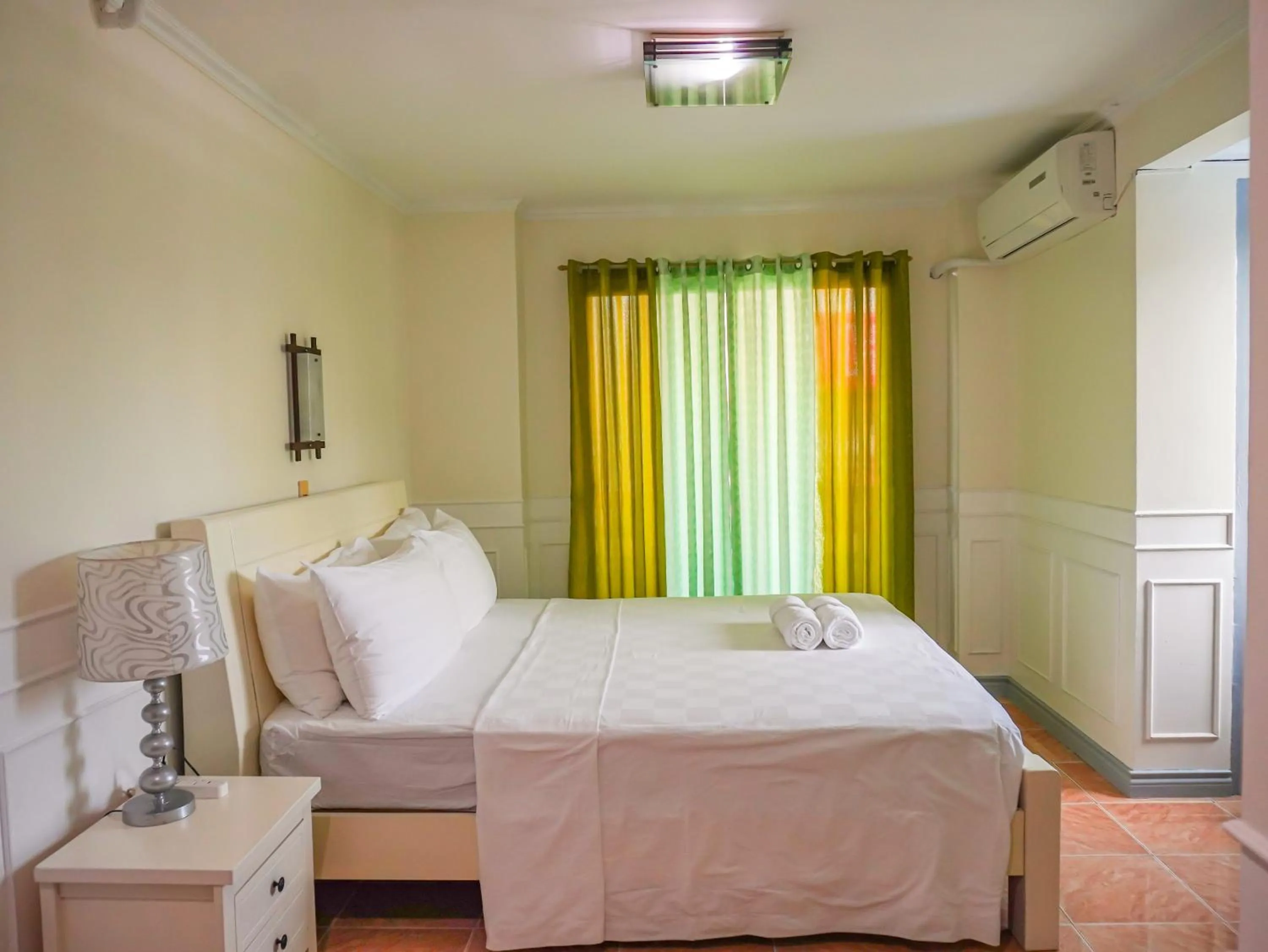 Photo of the whole room, Bed in Boracay Paradise Hotel