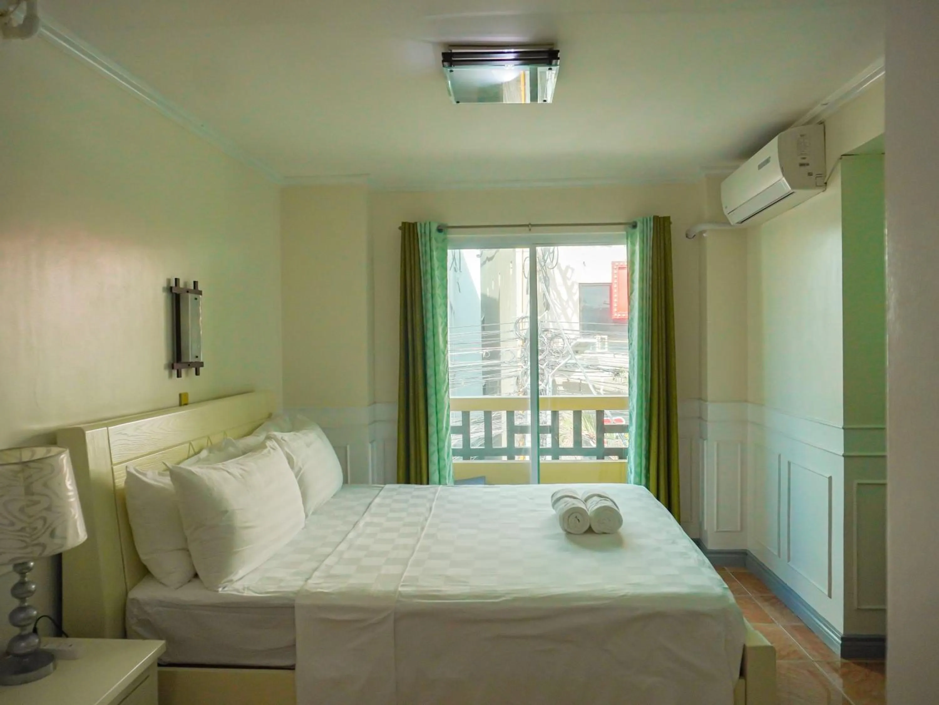 Photo of the whole room, Bed in Boracay Paradise Hotel