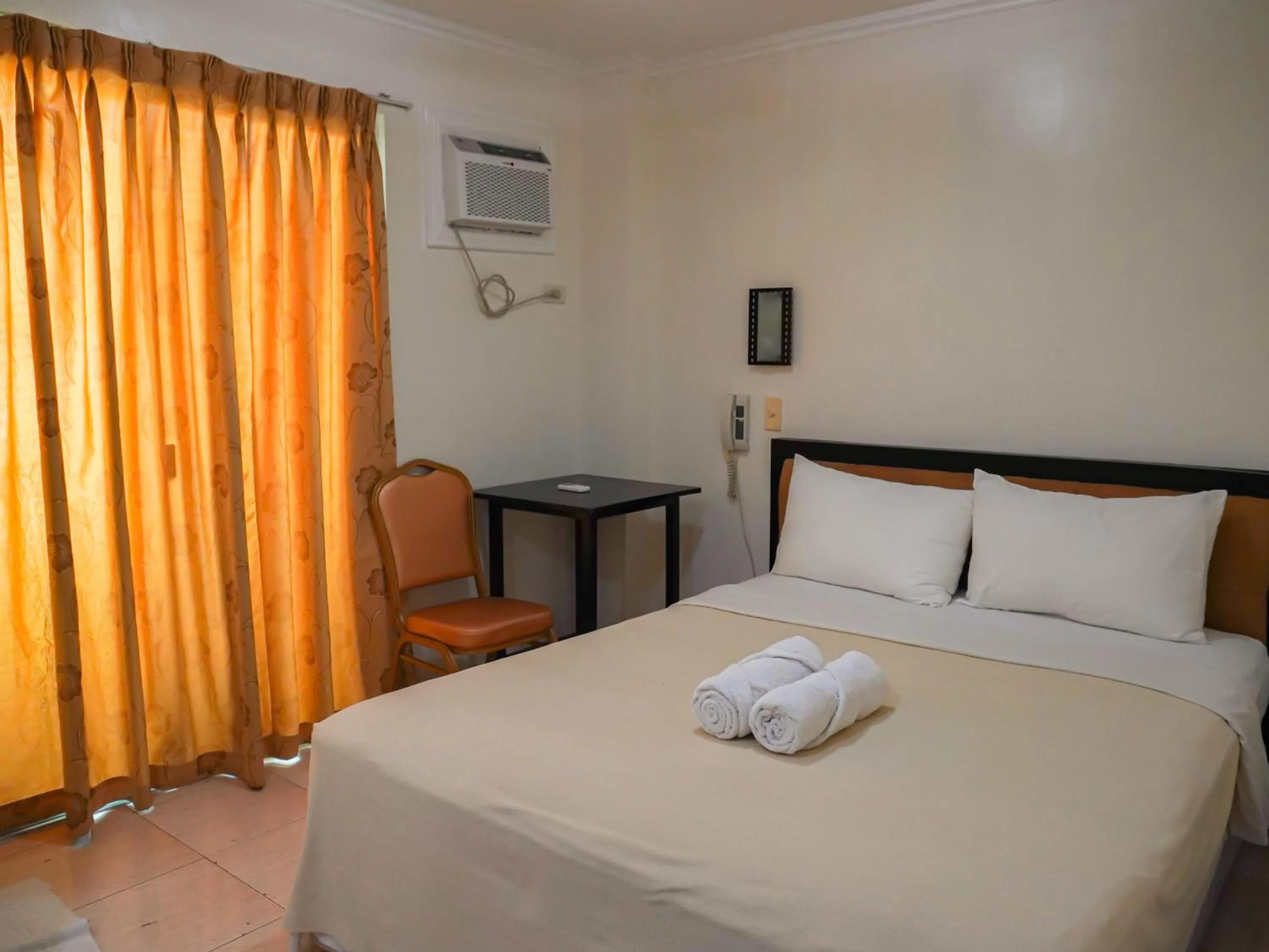 Bed in Boracay Paradise Hotel