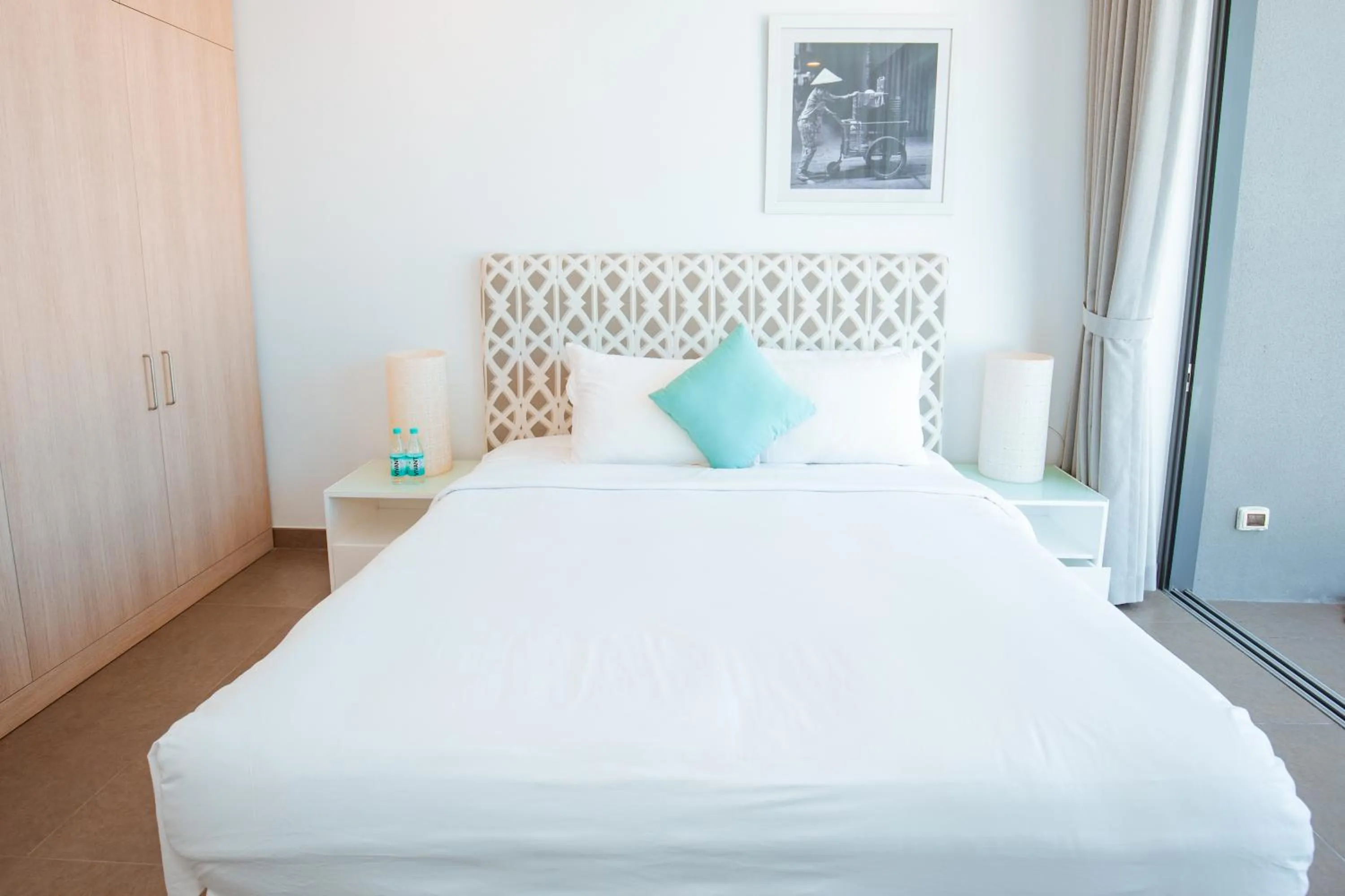 Bed in Beachfront 4 Bedrooms private pool villa Sanctuary Ho Tram resort