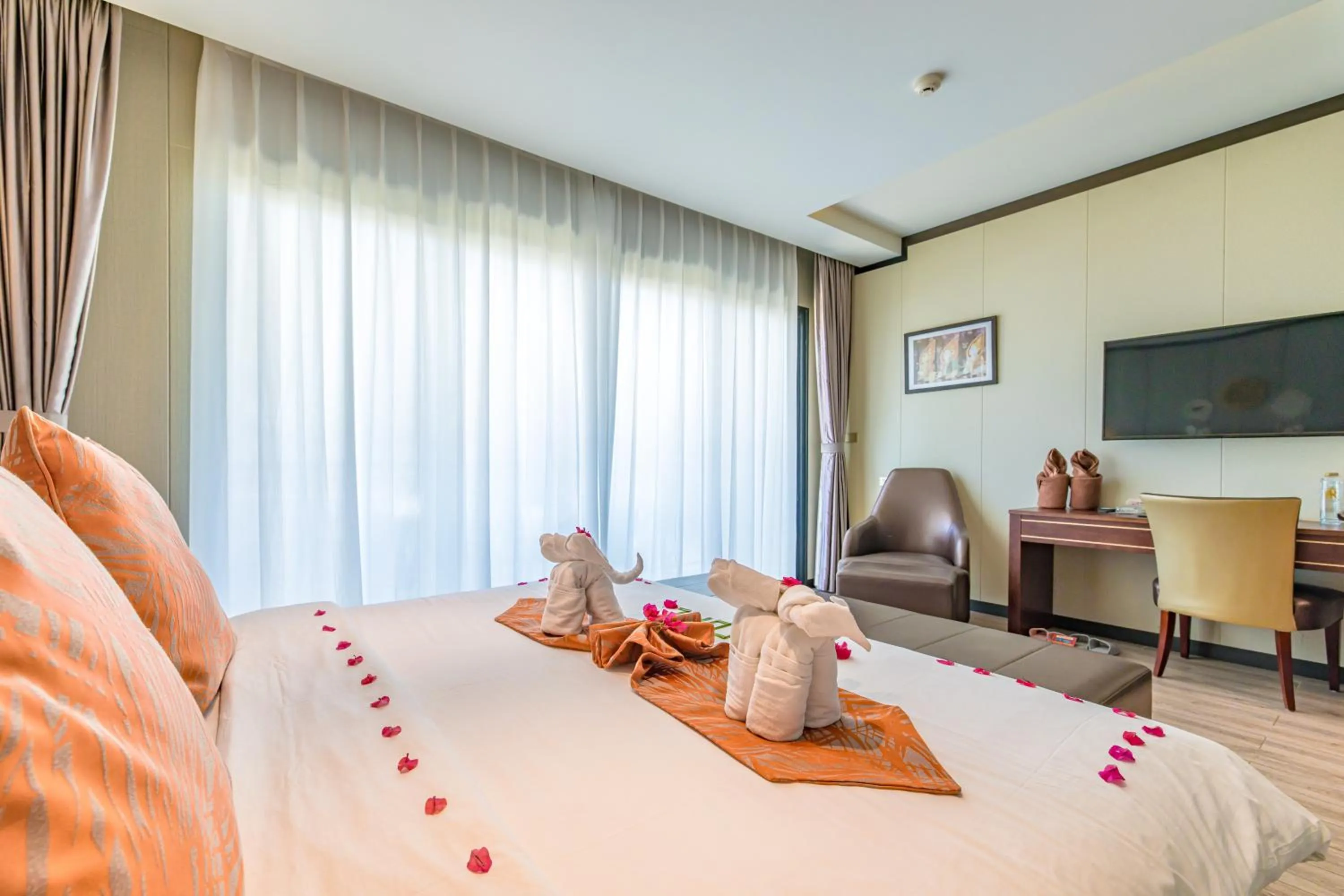 Bed in BJ & Radisson Sea View Hotel