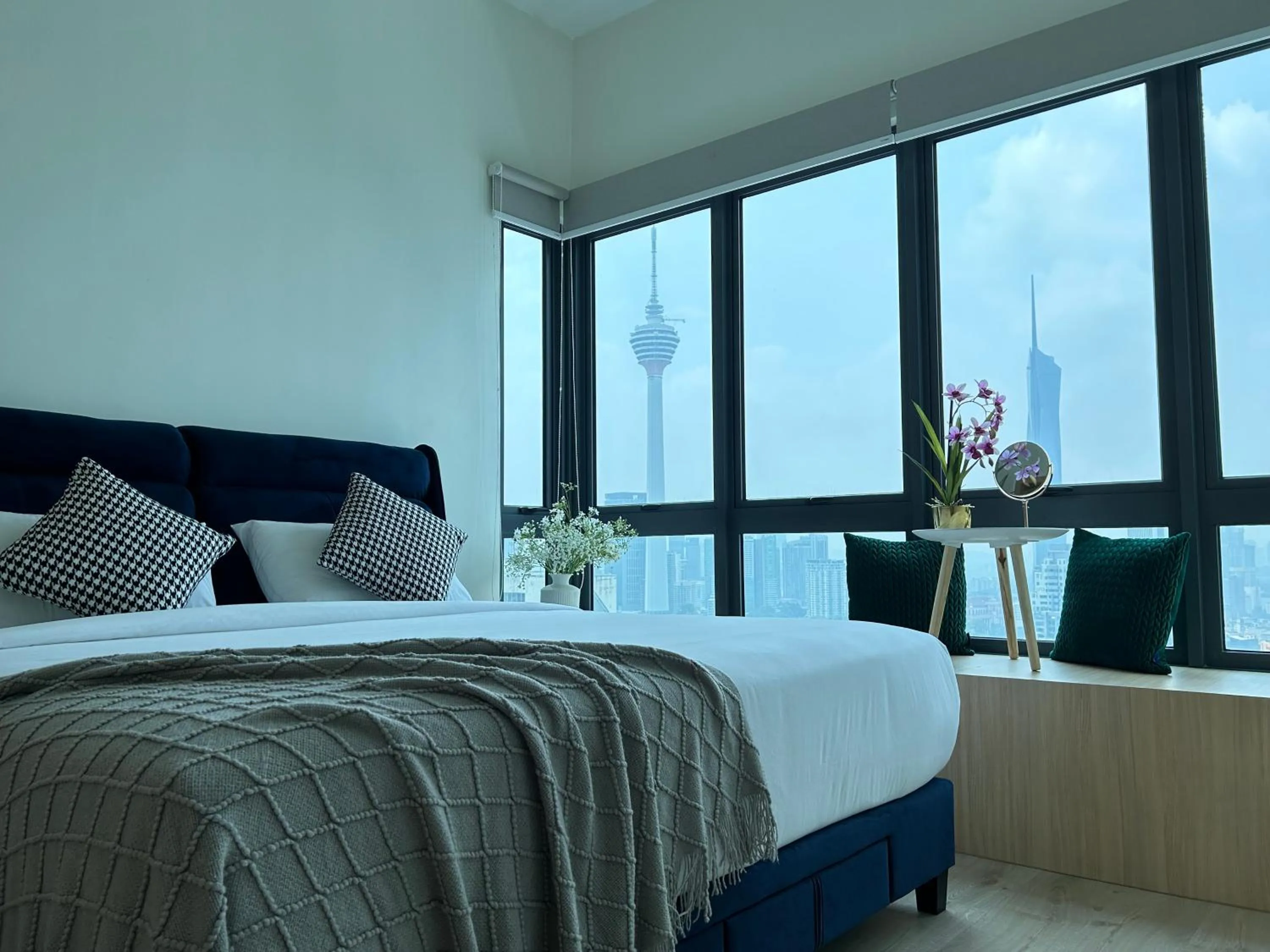 Bed in The Luxe by Infinitum Suites