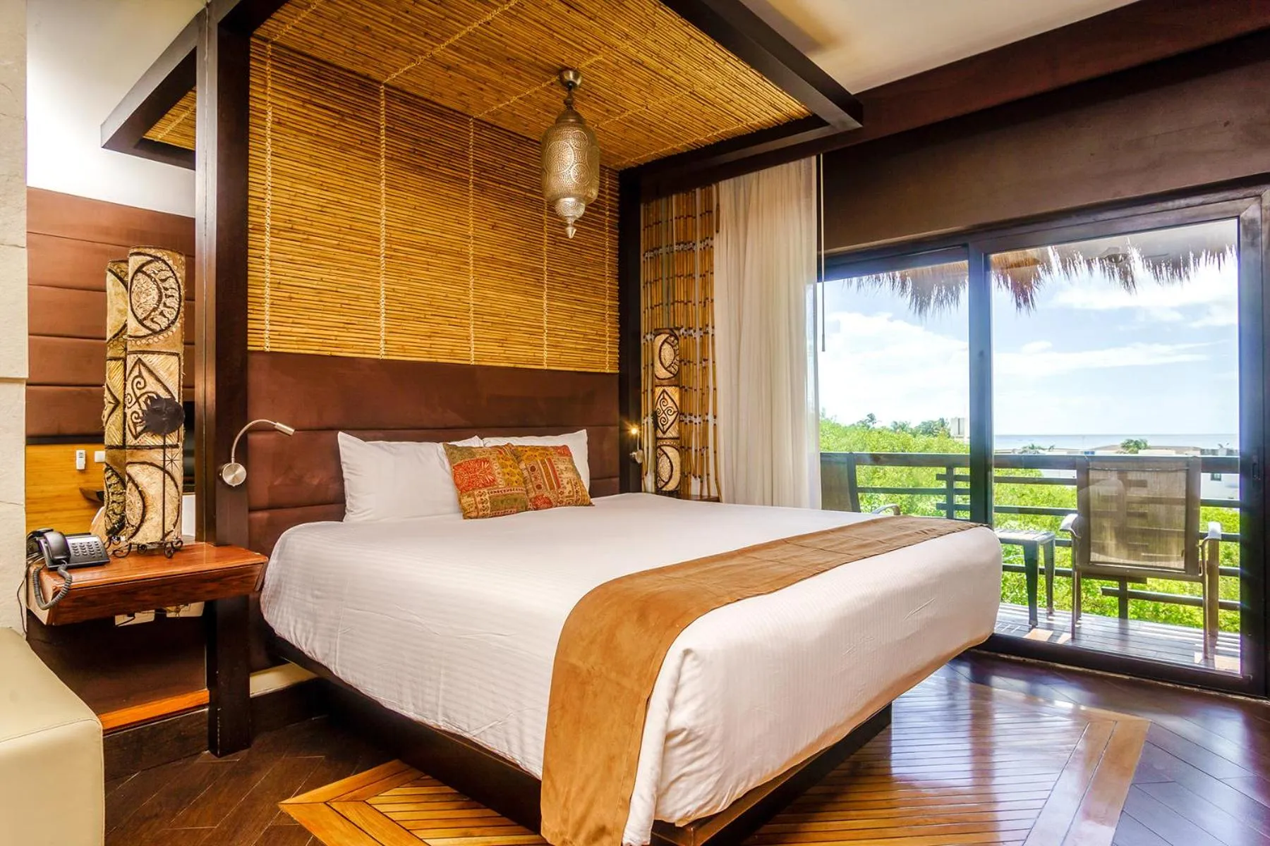 Bed in Aldea Thai by Stella Rentals