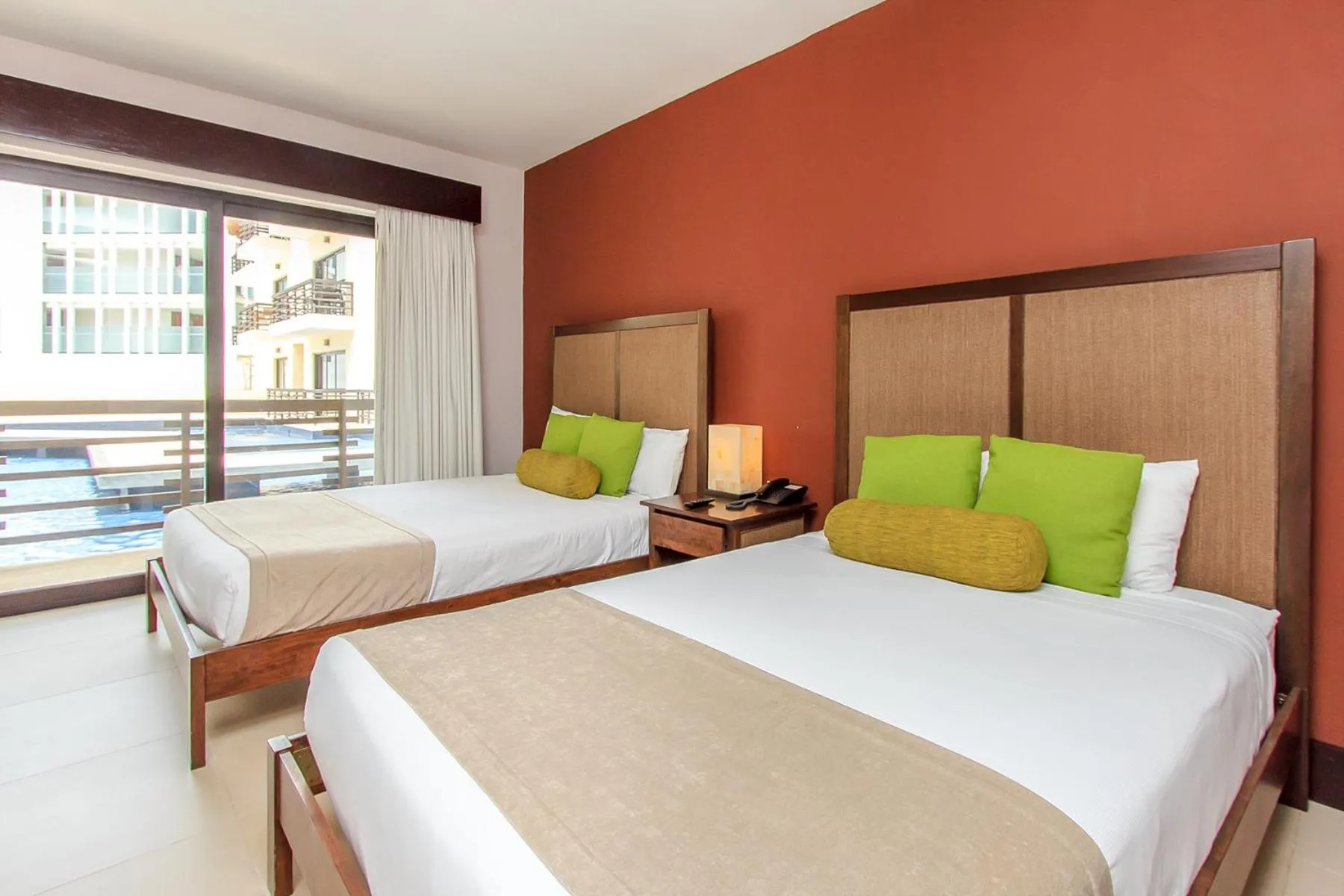 Bed in Aldea Thai by Stella Rentals