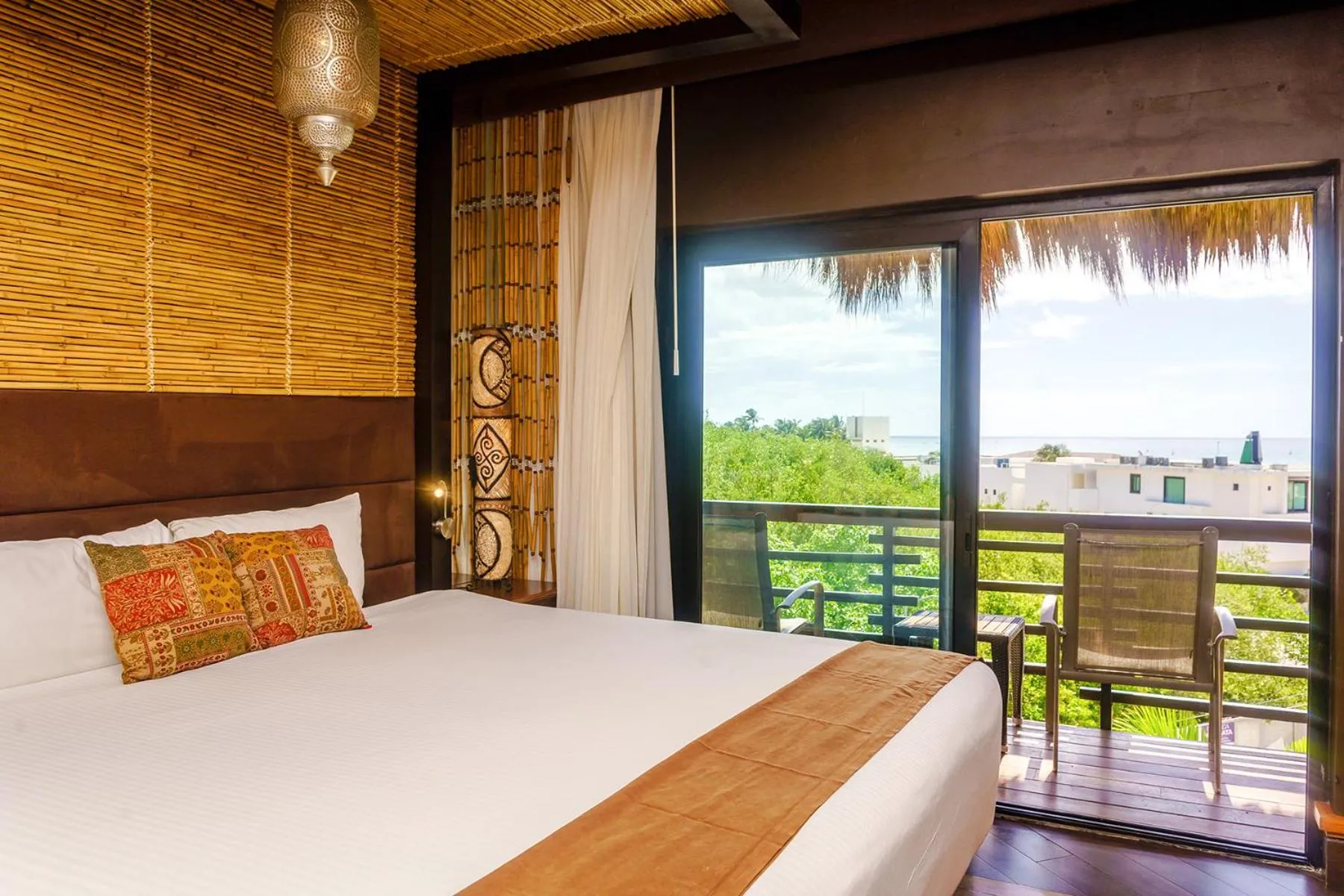 Bed in Aldea Thai by Stella Rentals