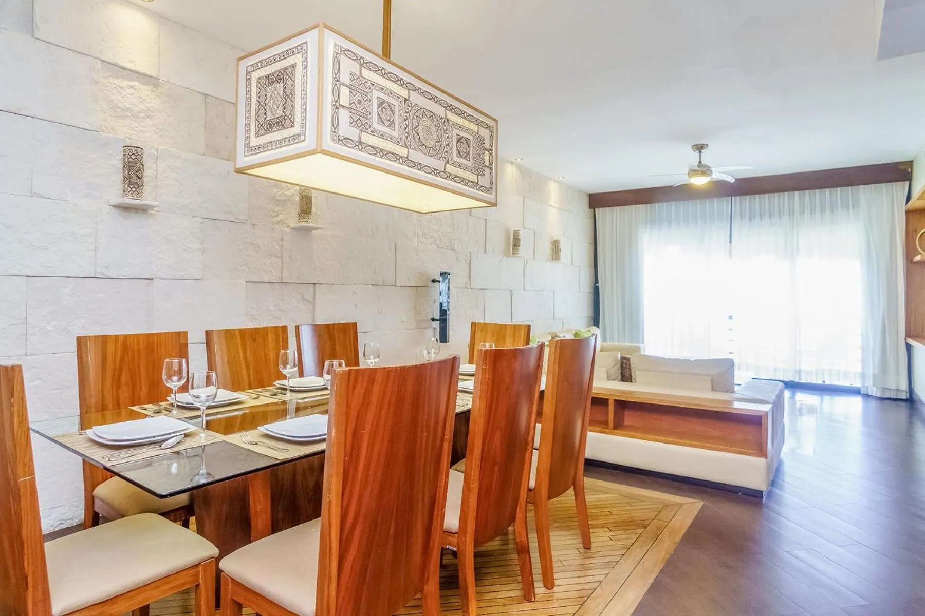 Living room in Aldea Thai by Stella Rentals