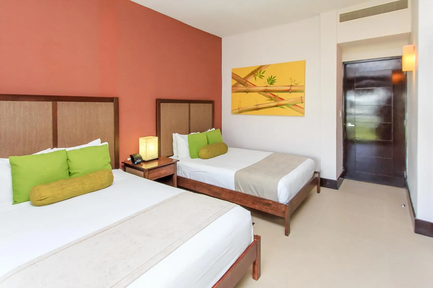 Bed in Aldea Thai by Stella Rentals