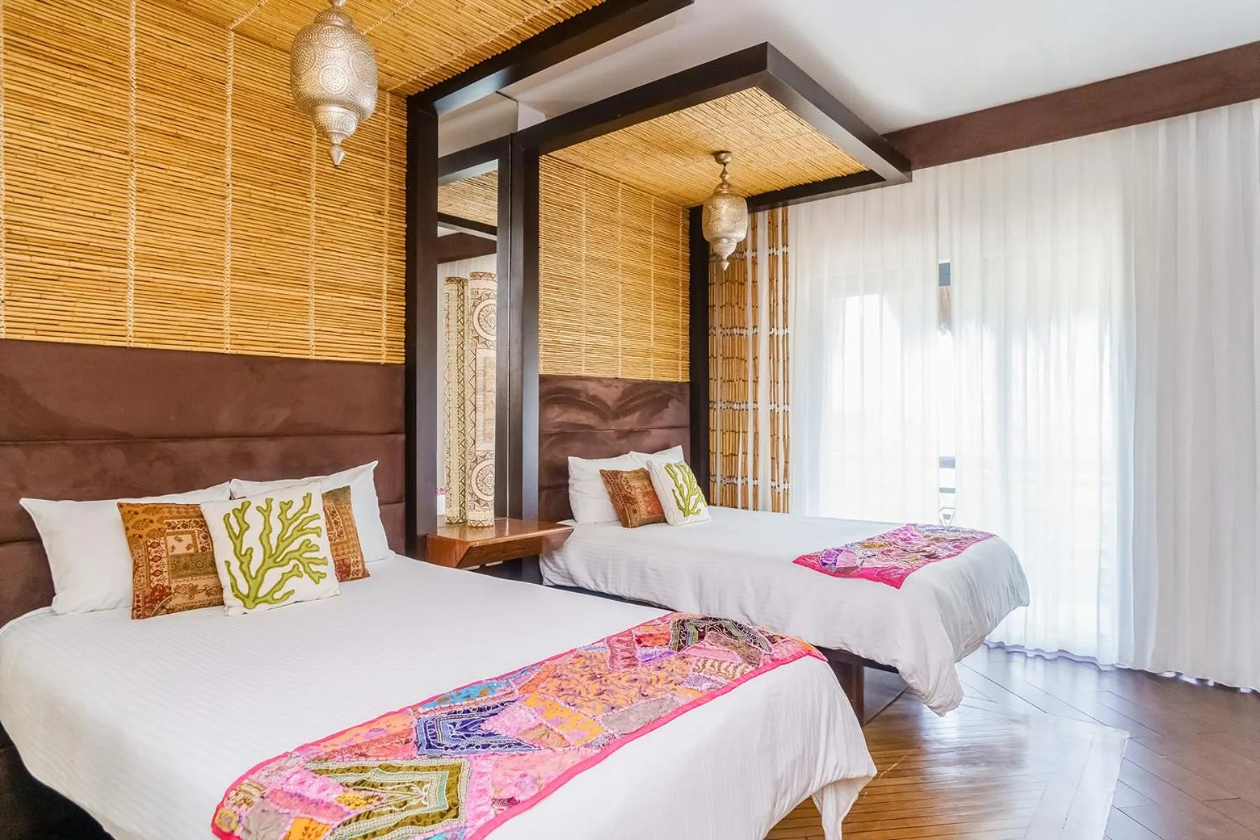 Bed in Aldea Thai by Stella Rentals
