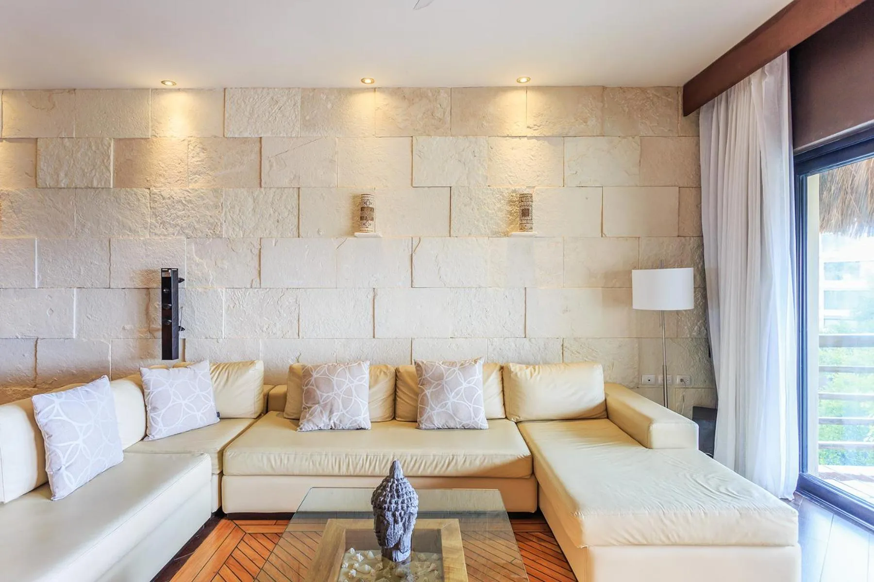Living room in Aldea Thai by Stella Rentals