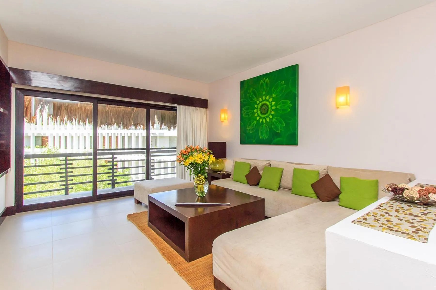 Living room in Aldea Thai by Stella Rentals