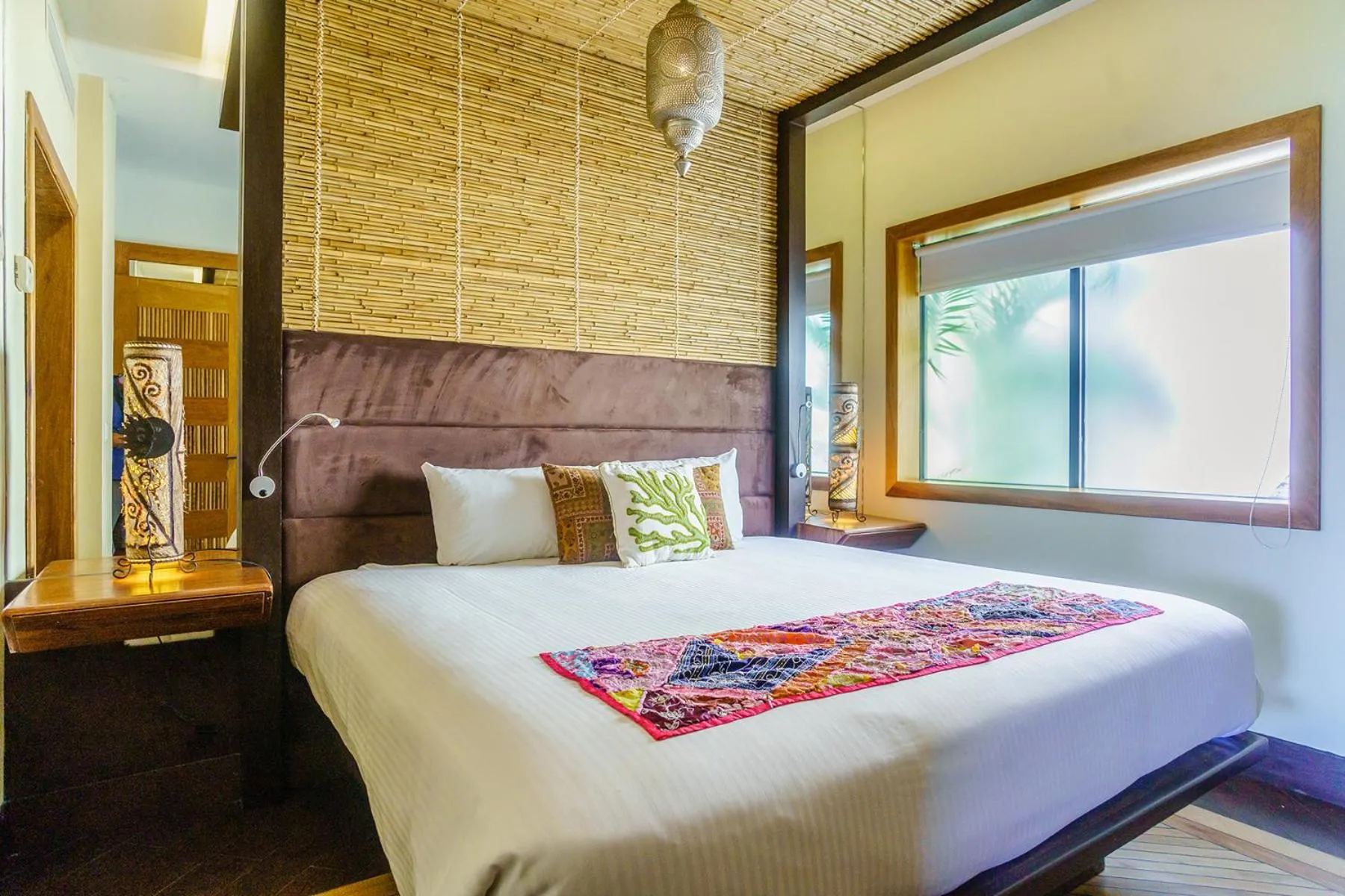 Bed in Aldea Thai by Stella Rentals