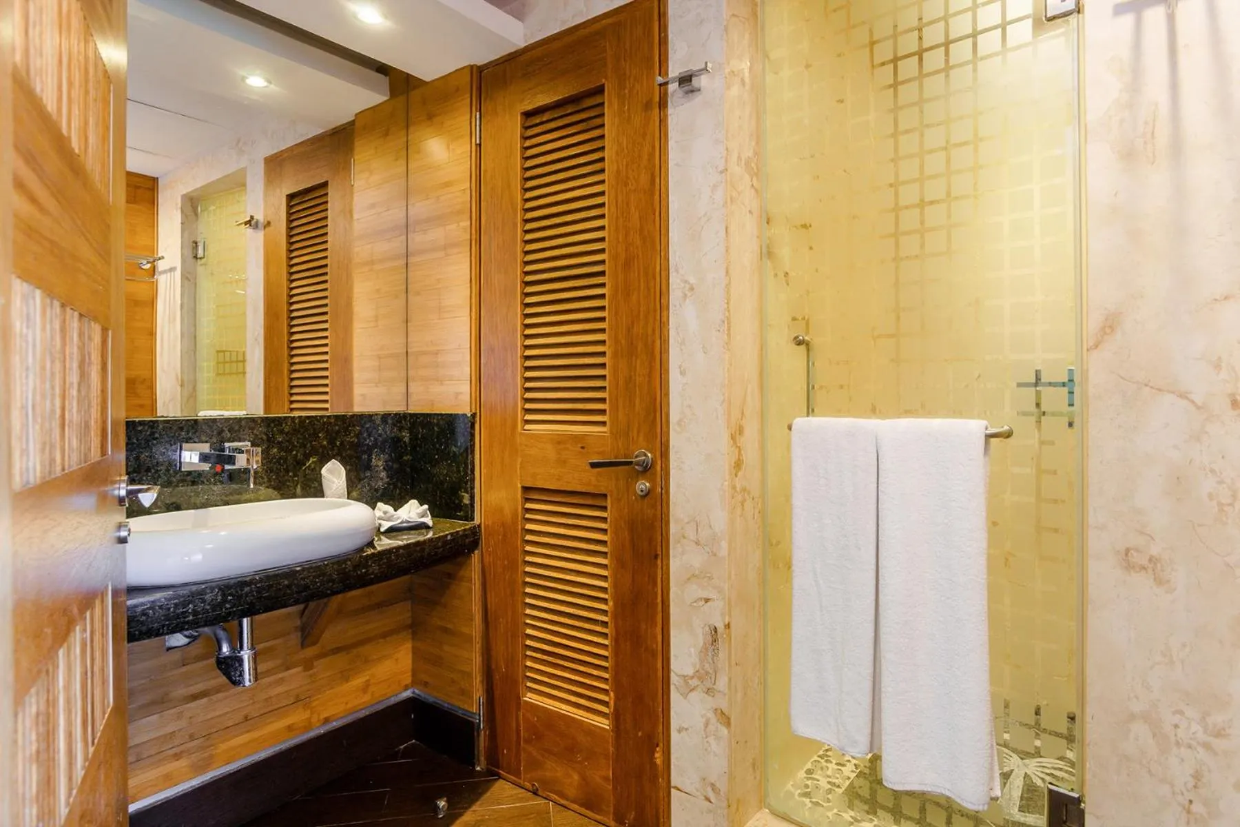 Bathroom in Aldea Thai by Stella Rentals