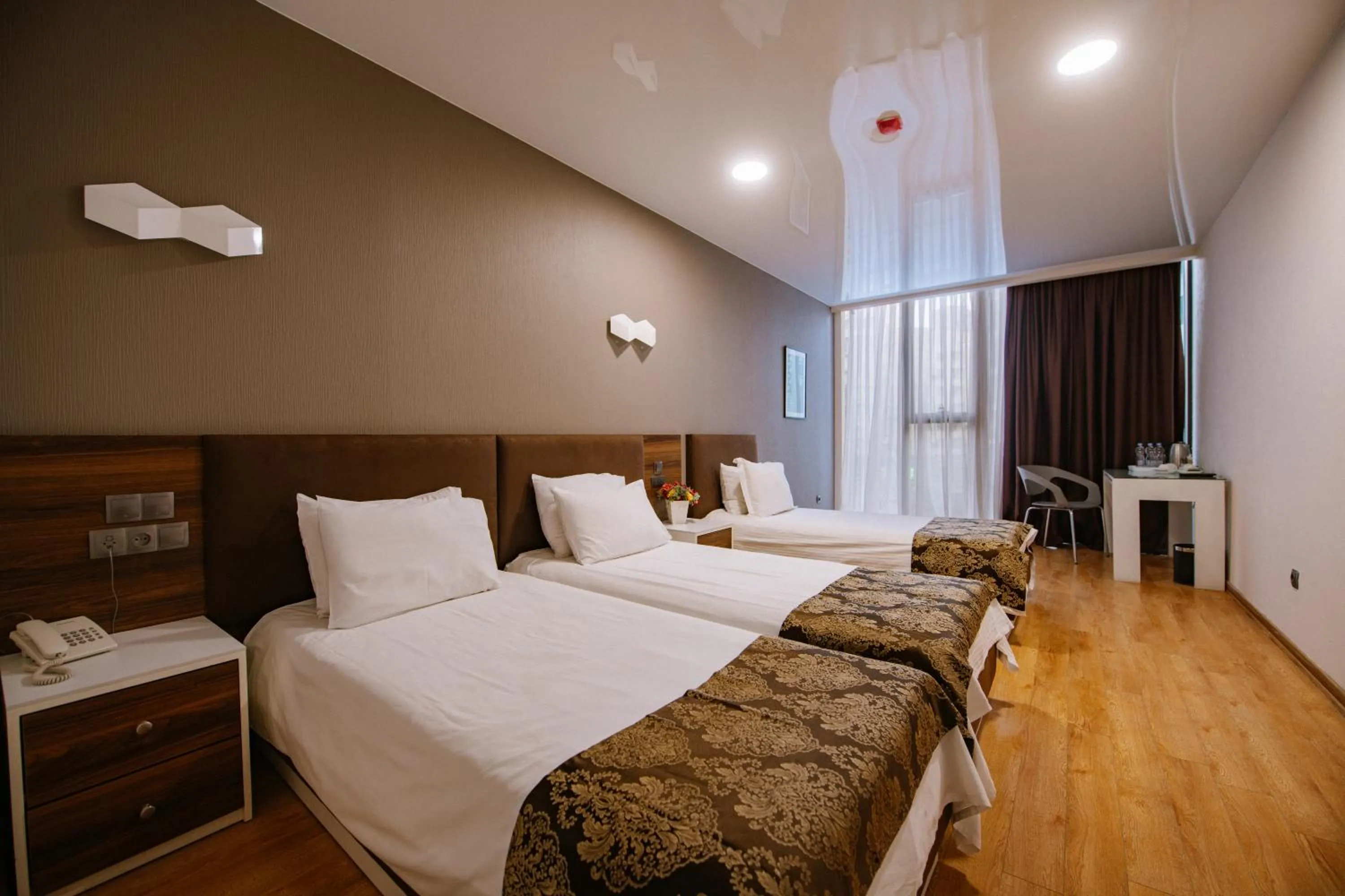 Photo of the whole room, Bed in Iveria Inn Hotel