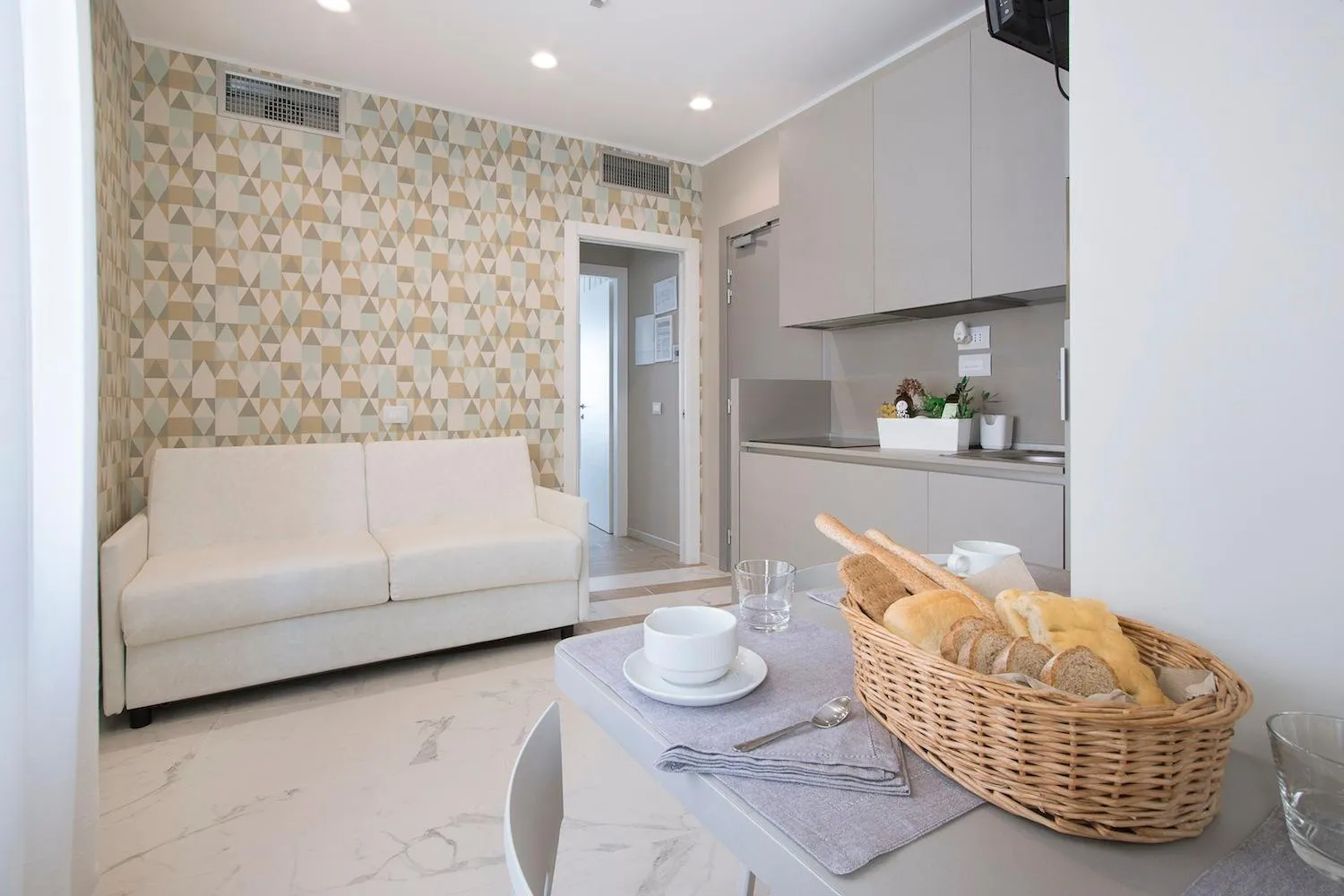 Seating area, Bed in Residence Dolcemare