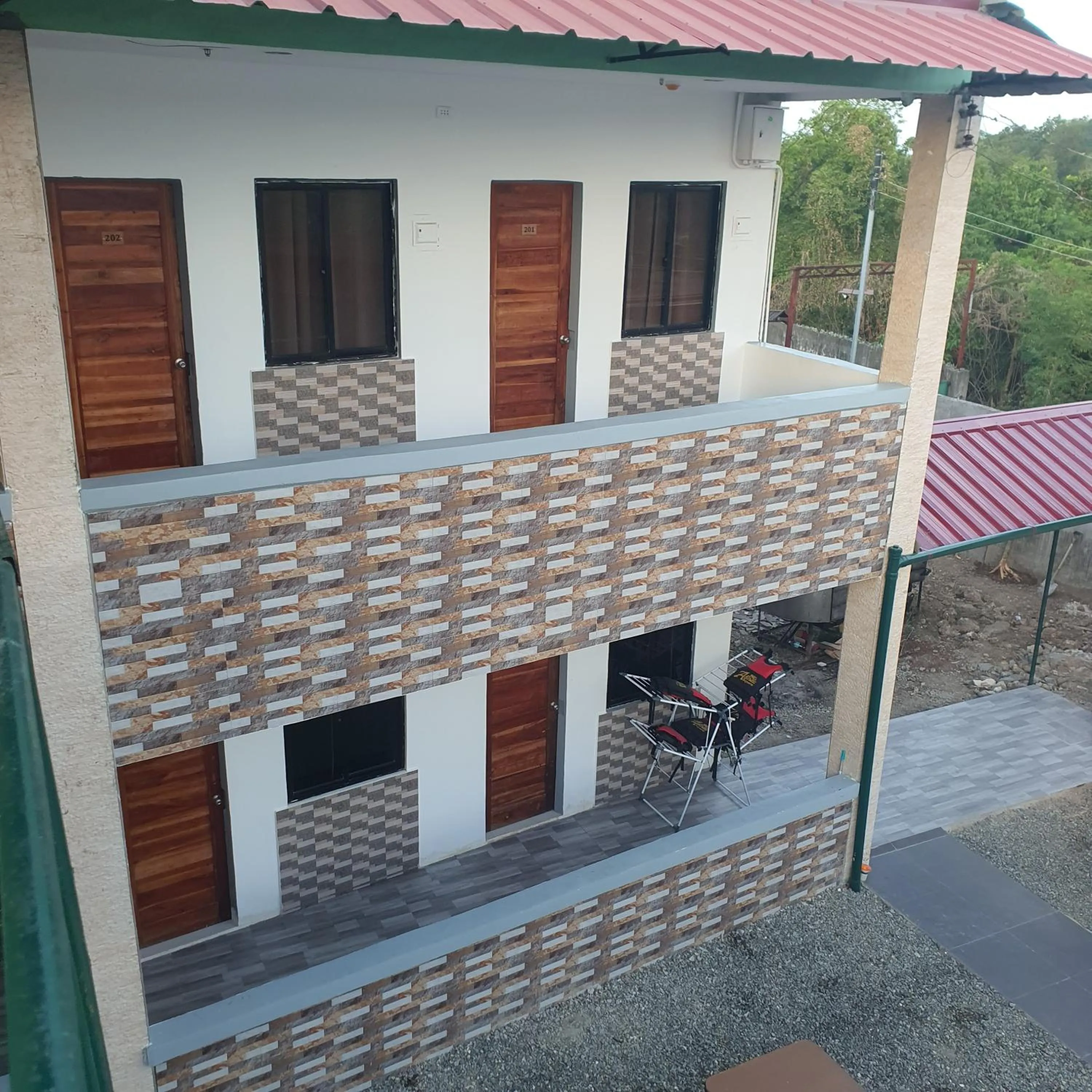 Property building in AOSMECPoolCamp Hotel