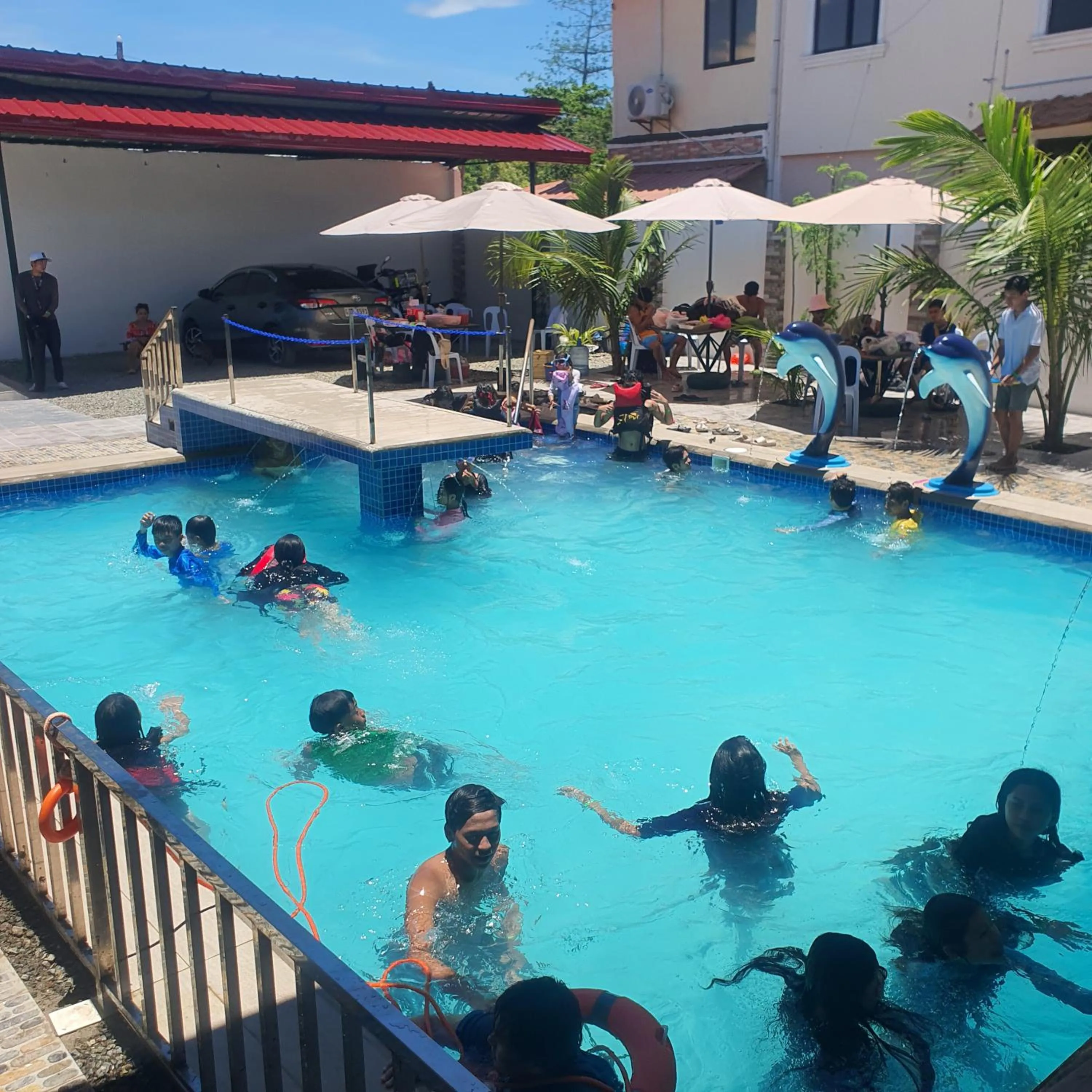 Property building in AOSMECPoolCamp Hotel