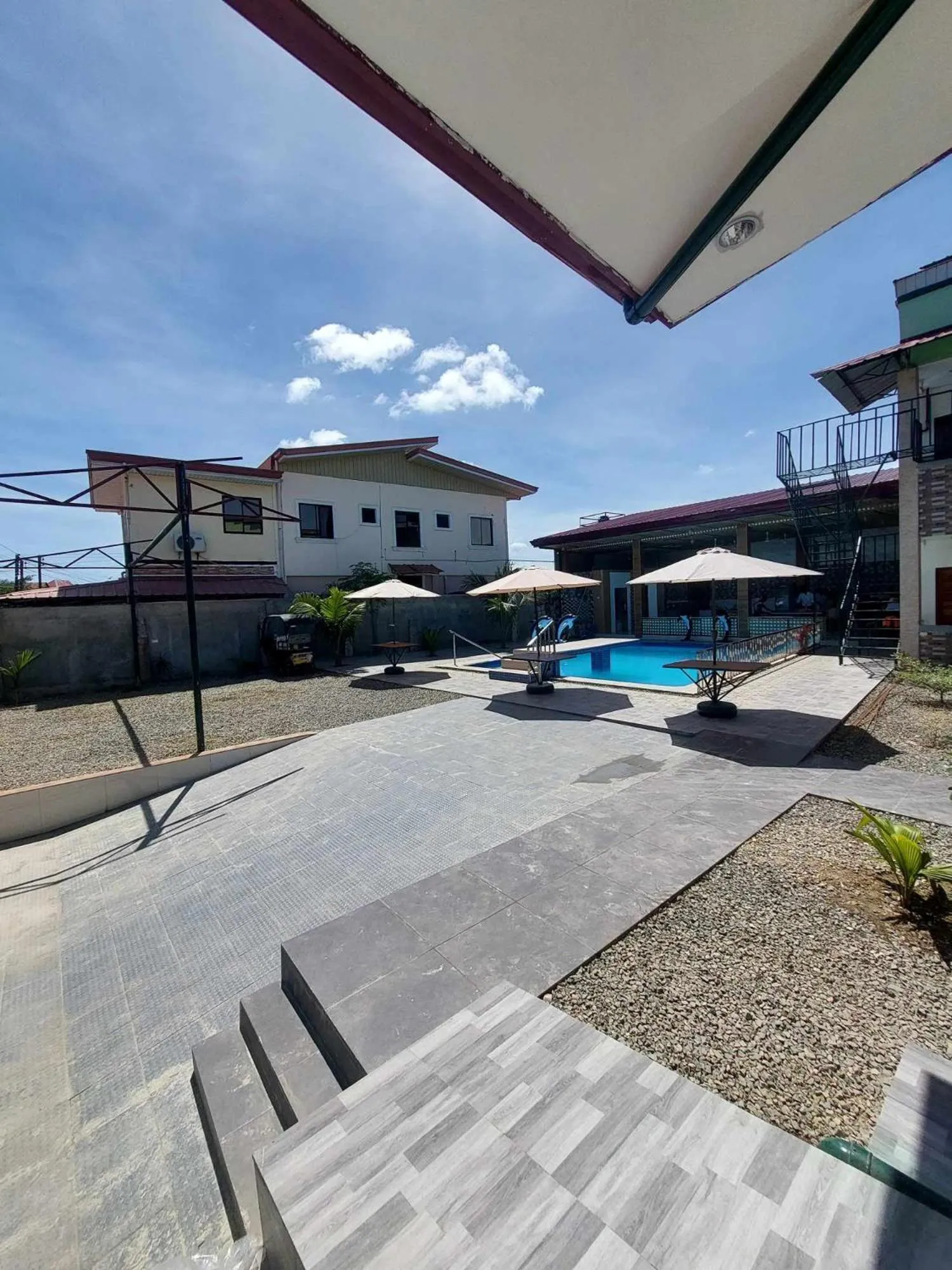 Property building in AOSMECPoolCamp Hotel