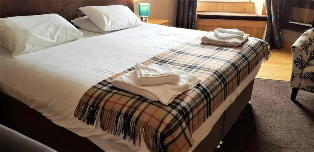 Bed in The Harbour House Sea Front Hotel