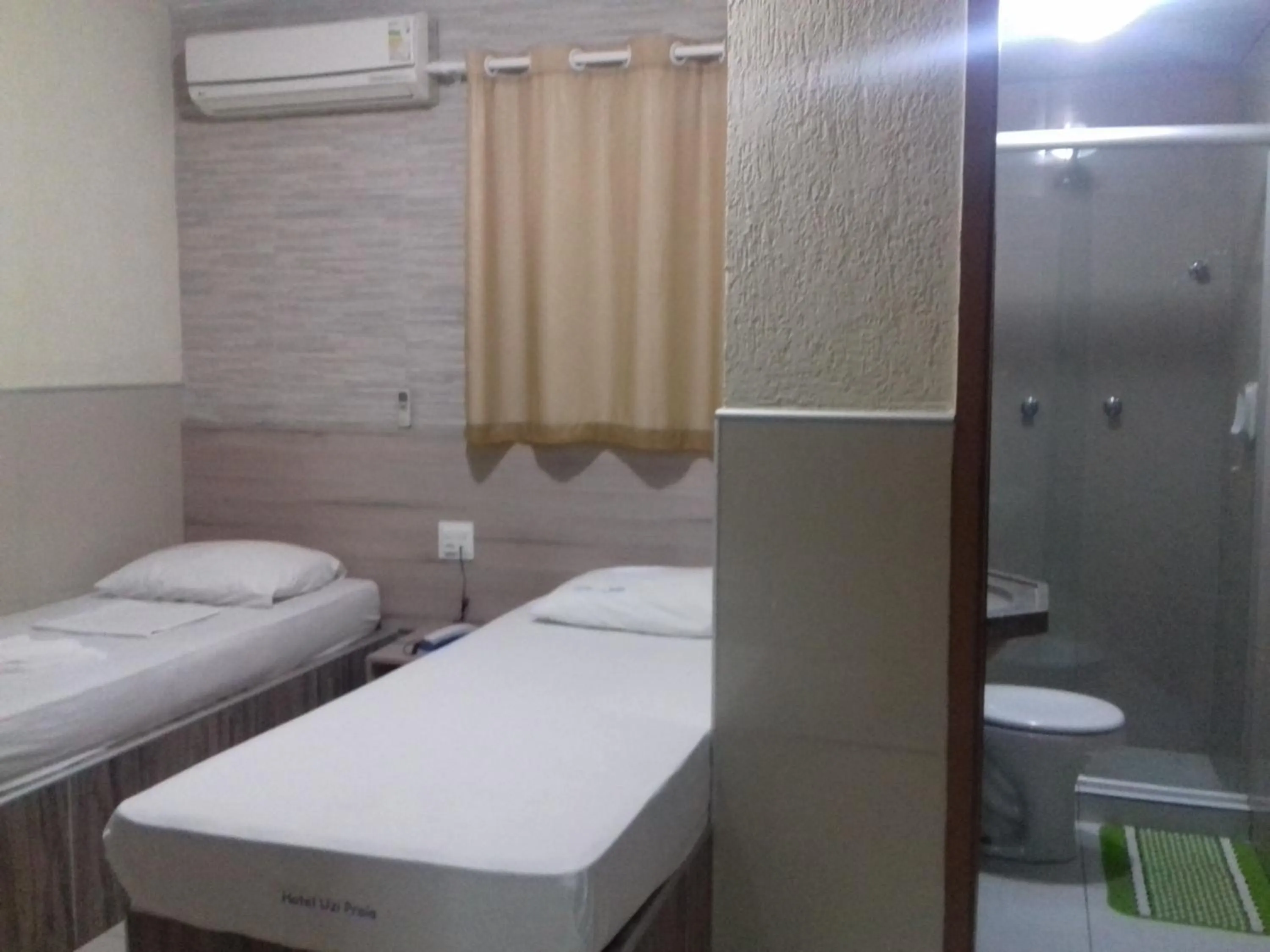 Bed in Hotel Uzi Praia