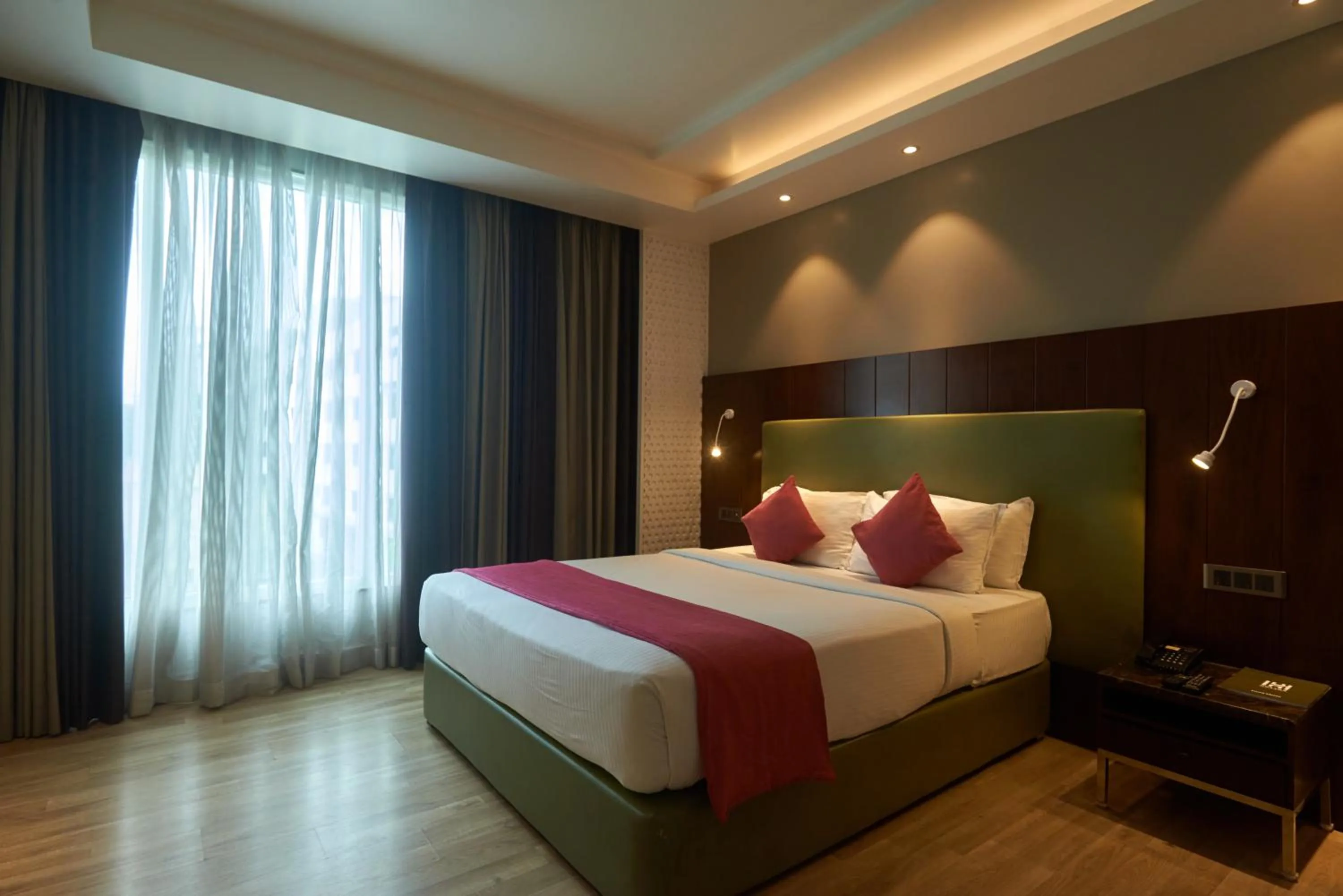 Bed in Tania President Inn